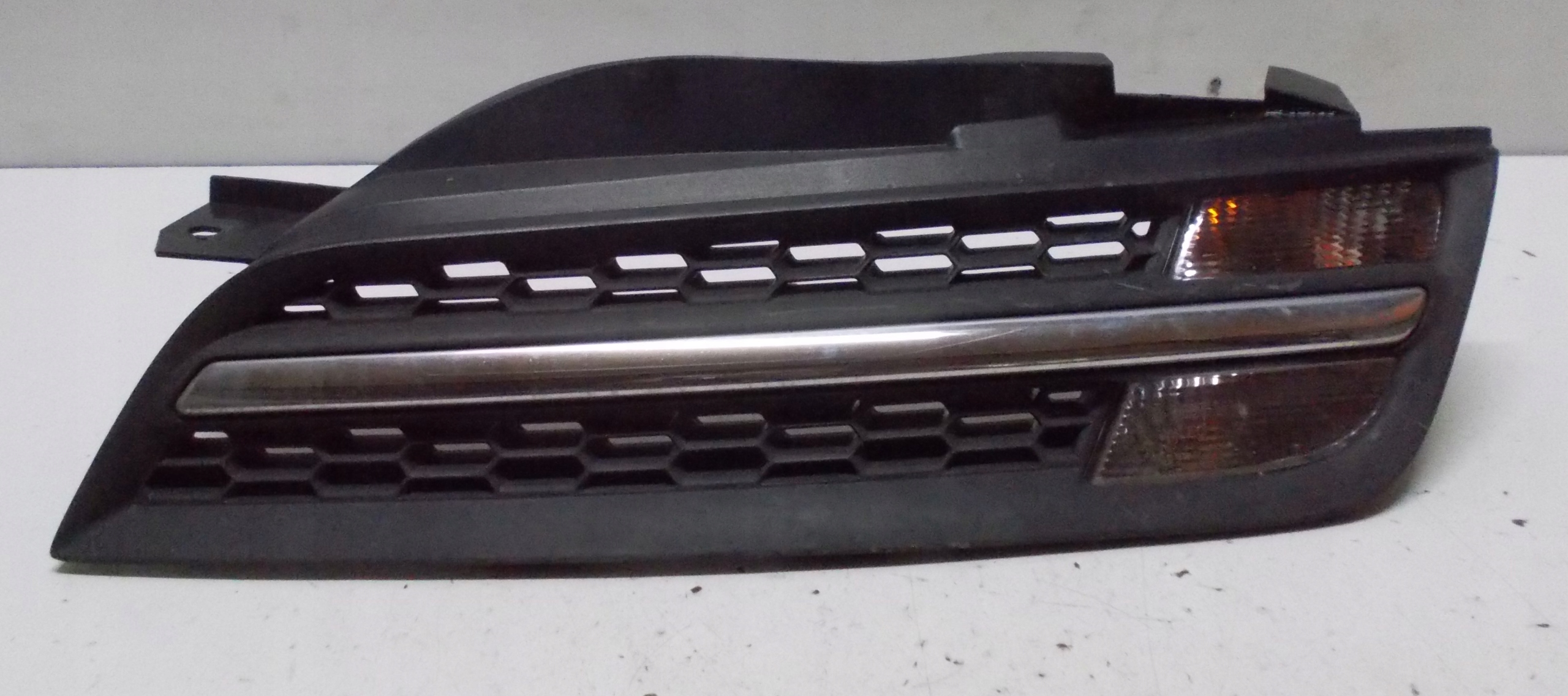 NISSAN MICRA K12 O7R grid of a bumper indicator left 62330