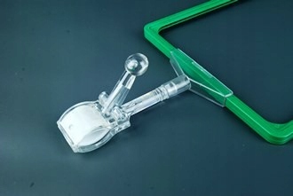 

Uchwyt zaciskowy do ramki plastikowej