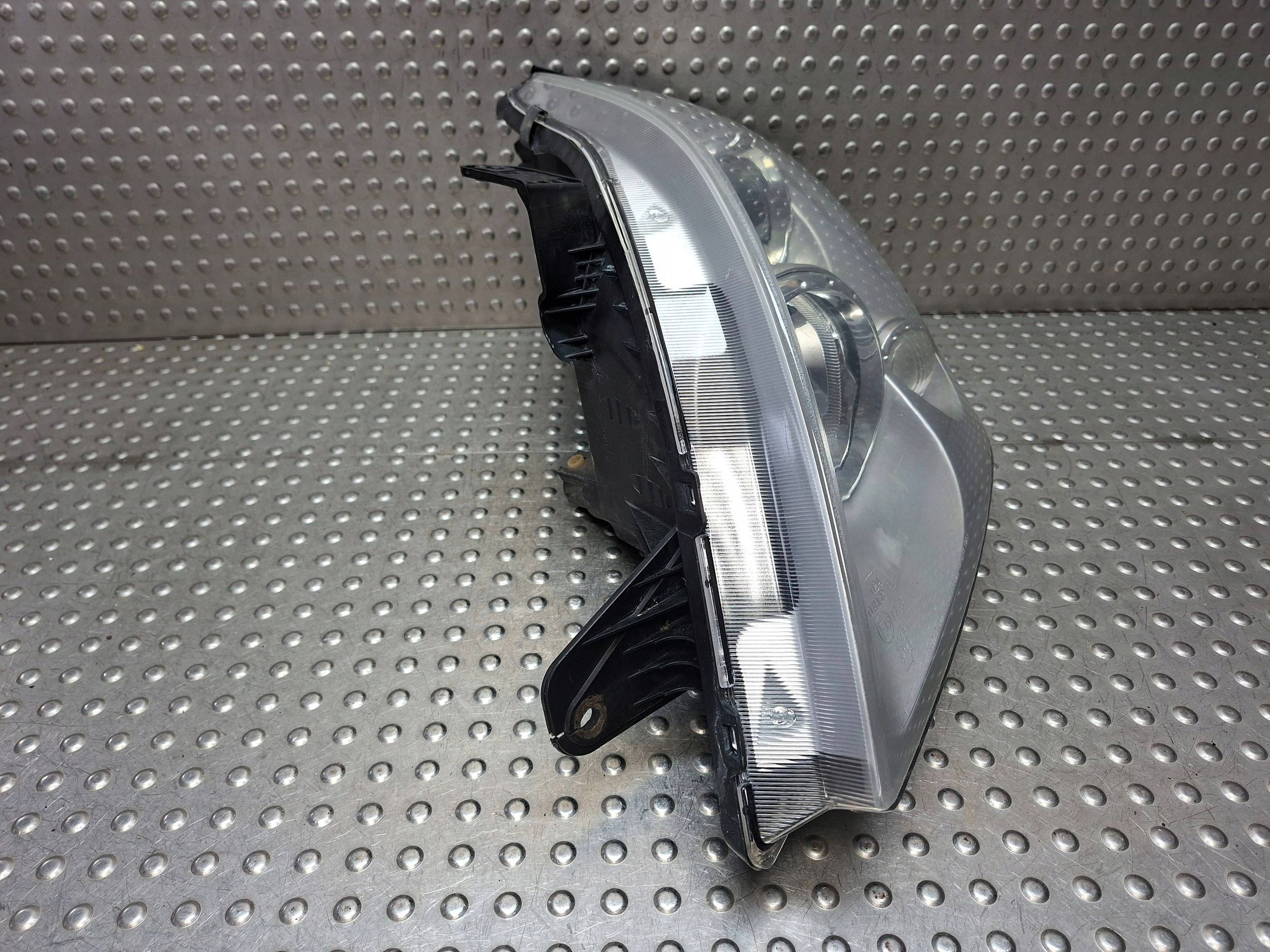 light left REFLEKTOR SSANGYONG REXTON and 01-06 EUROPA 108-0399