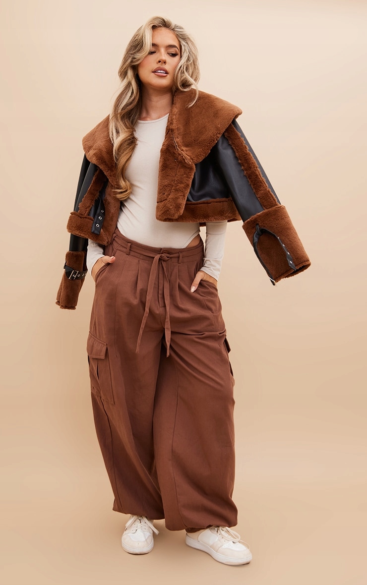 PRETTYLITTLETHING BODY BEŻOWE GŁADKIE DŁUGI RĘKAW RS D572103 Rozmiar S (36)