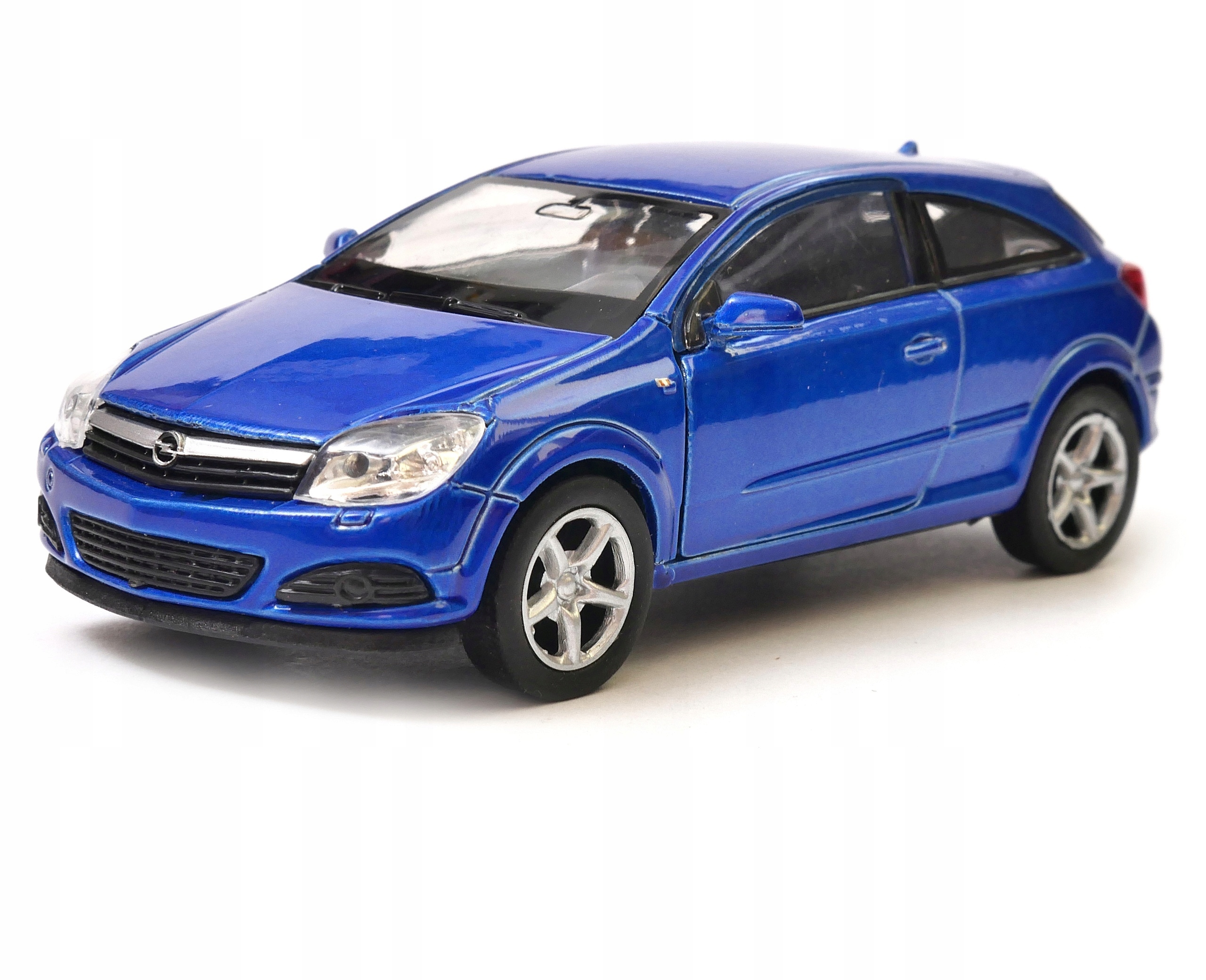 Игрушечные машинки опель. Opel astra gtc игрушка. Модель opel corsa welly. Машинка опель игрушка велли. Металлическая модель машины опель астра 49749.