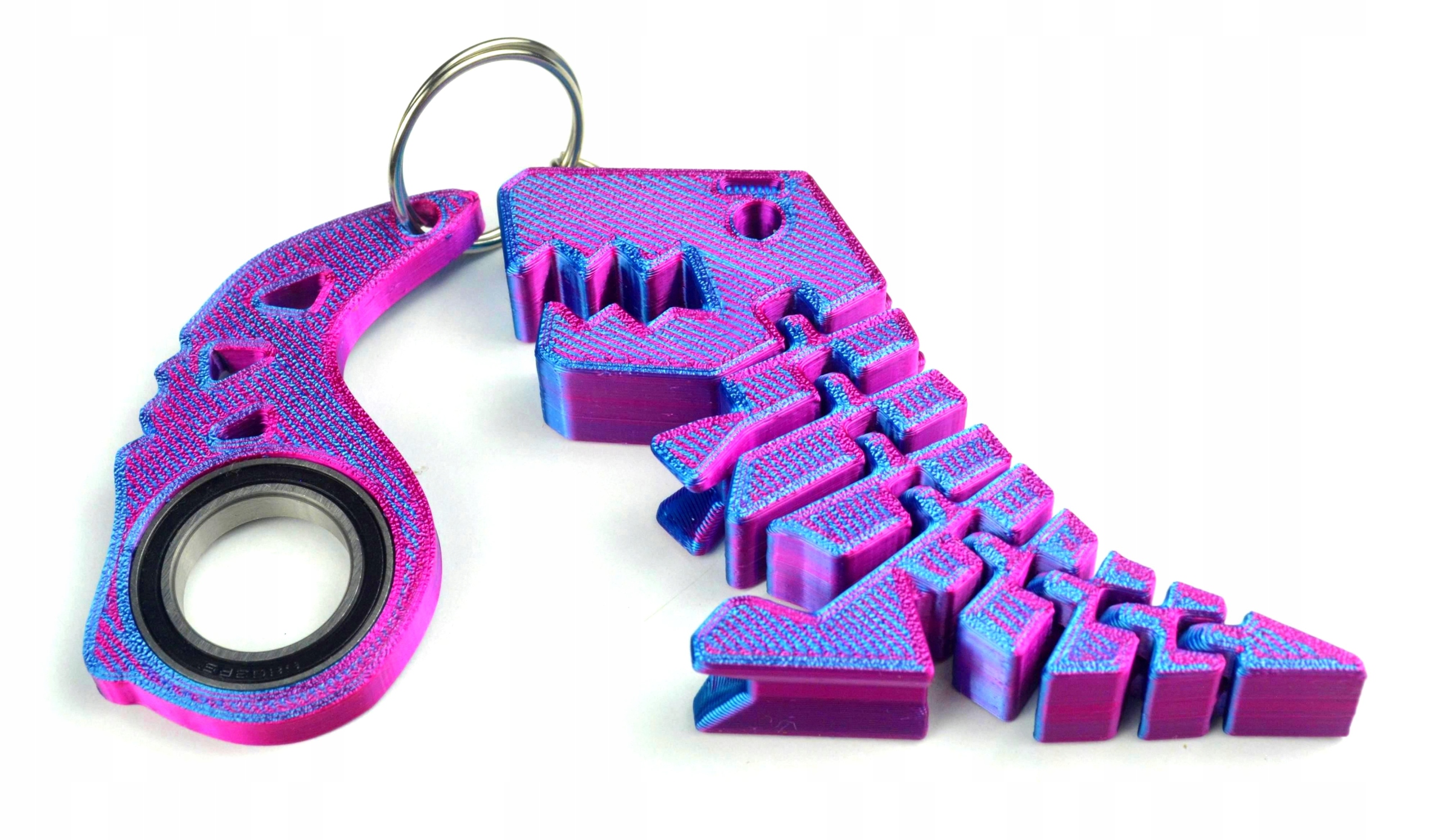 Keyrambit Zestaw KEYSPINNER Brelok + Flexi Rex Dino TikTok Kolor PINK FLUO Wiek dziecka 3 lata +