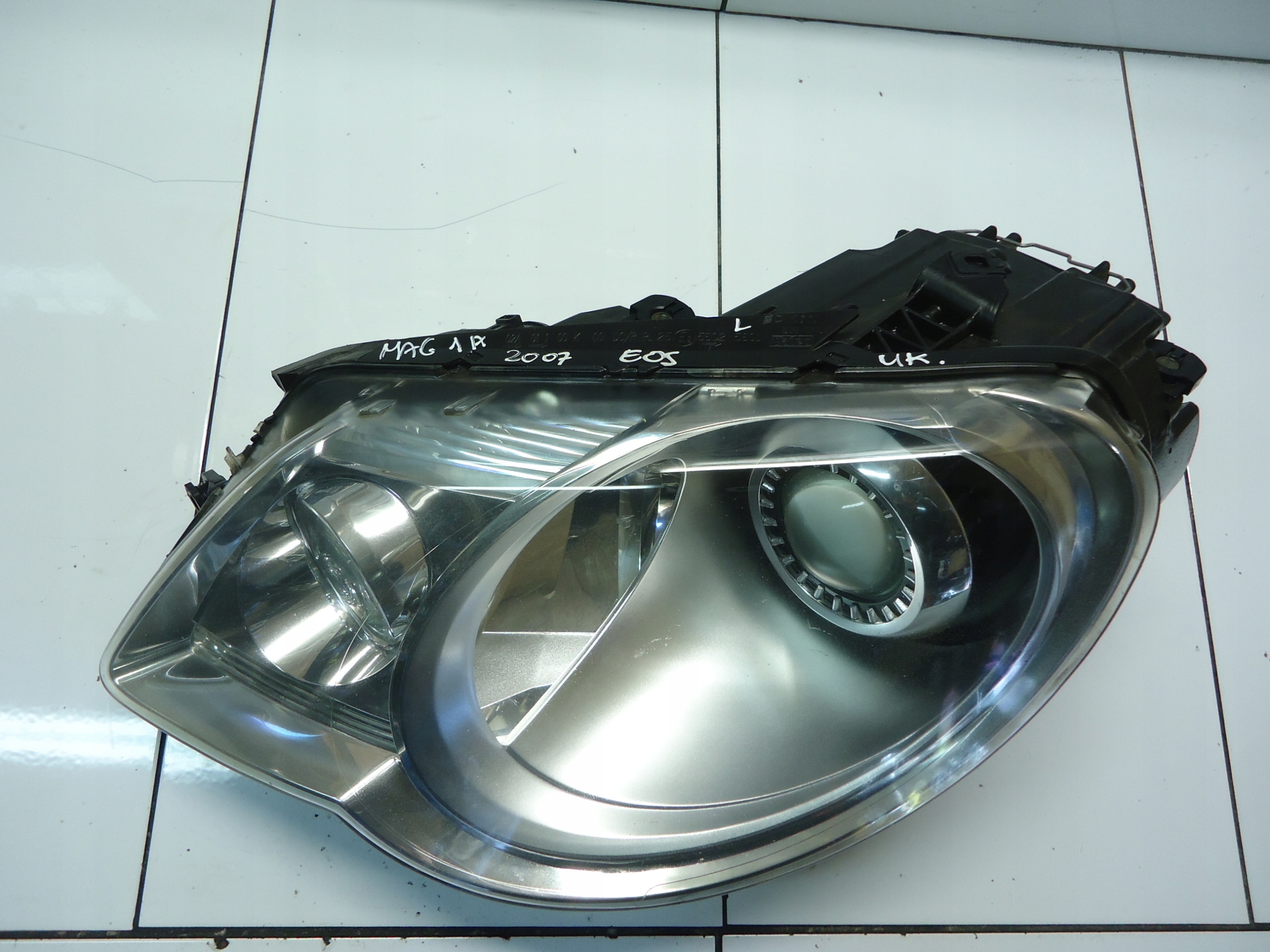 VW EOS light left left front BIXENON 1Q2941751A 89314110 4L0907391