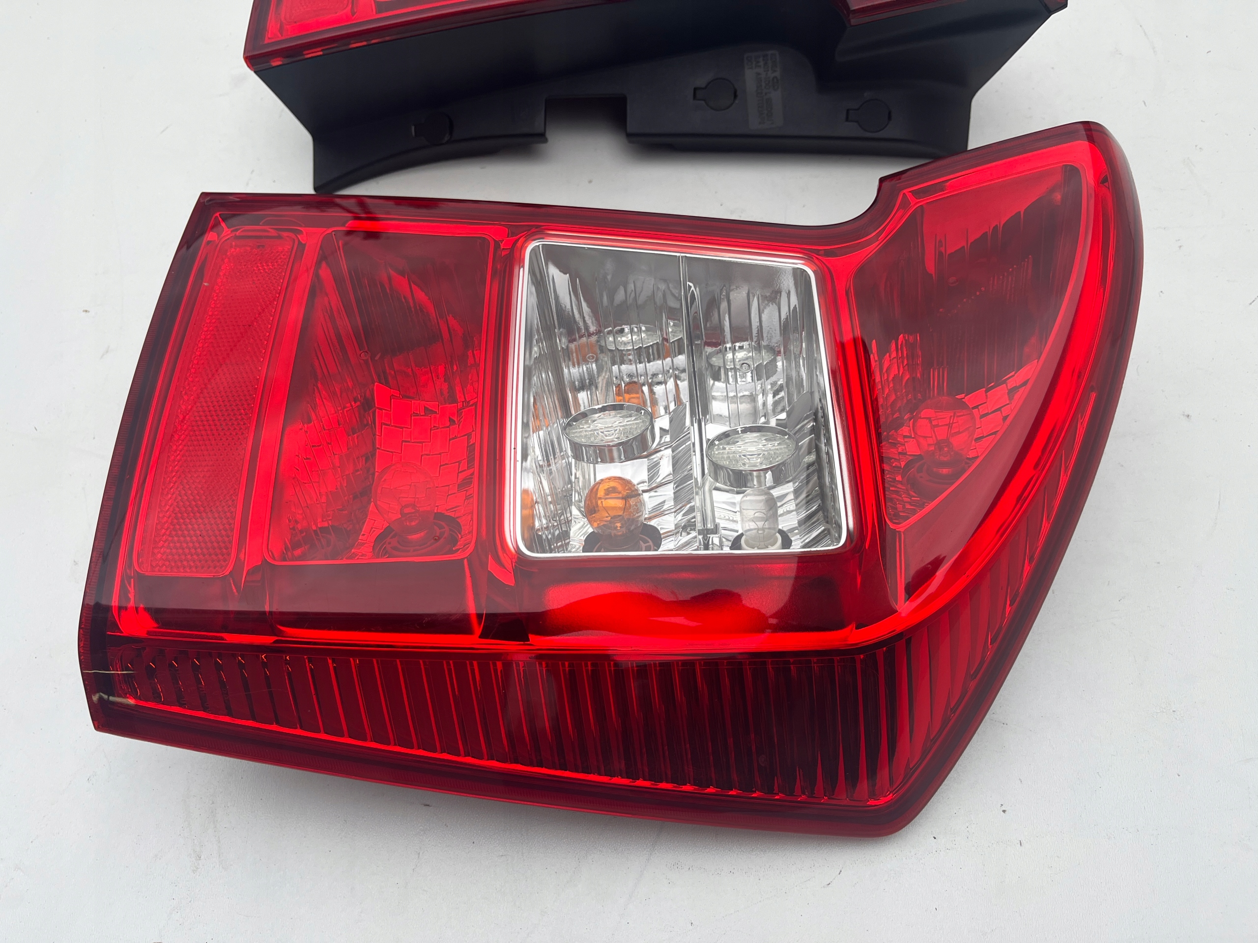 light right left rear part KIA Carens III 06-12r. OEM