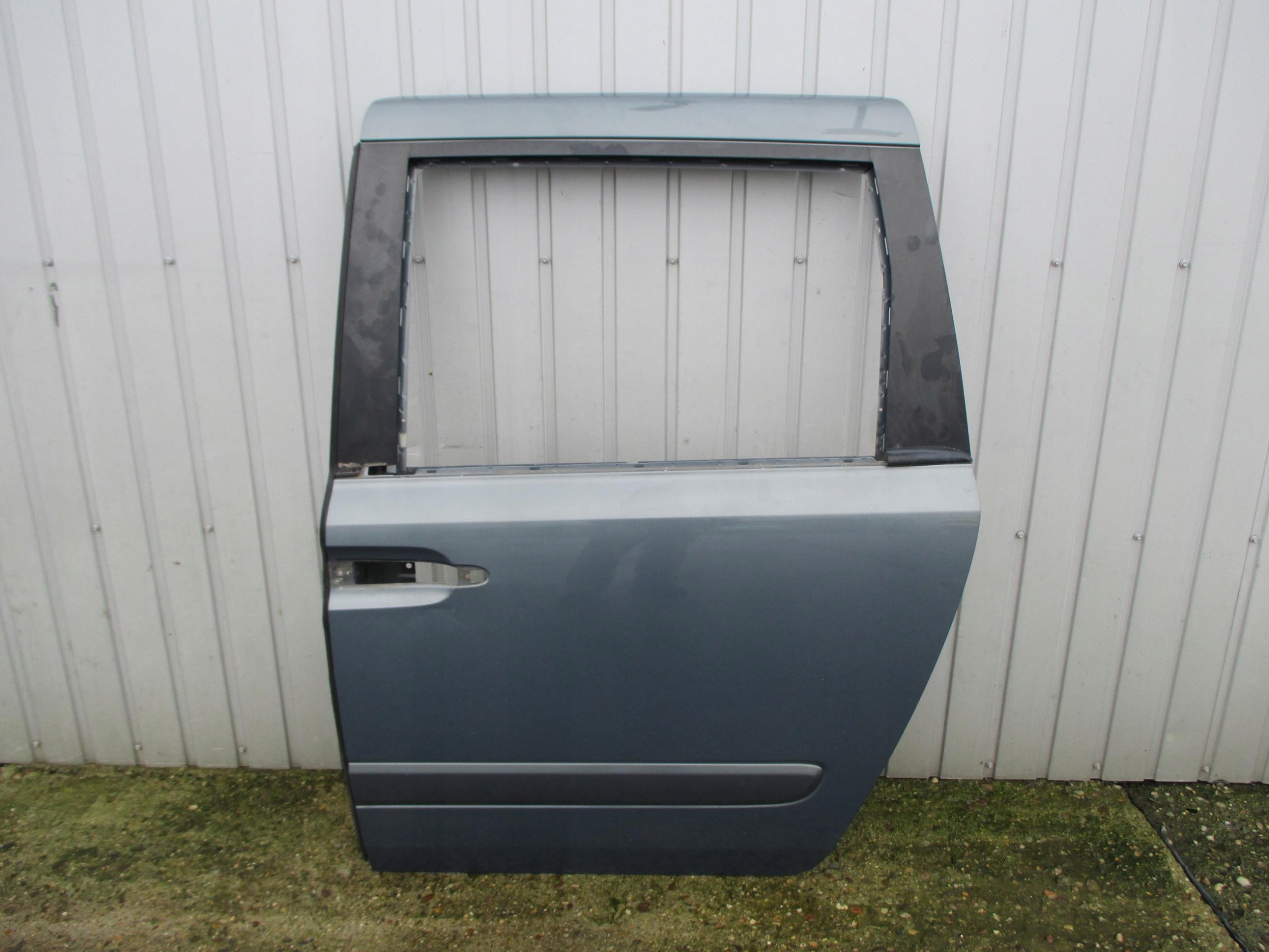 CARNIVAL III 04-14 DRZWI LEWY TYŁ