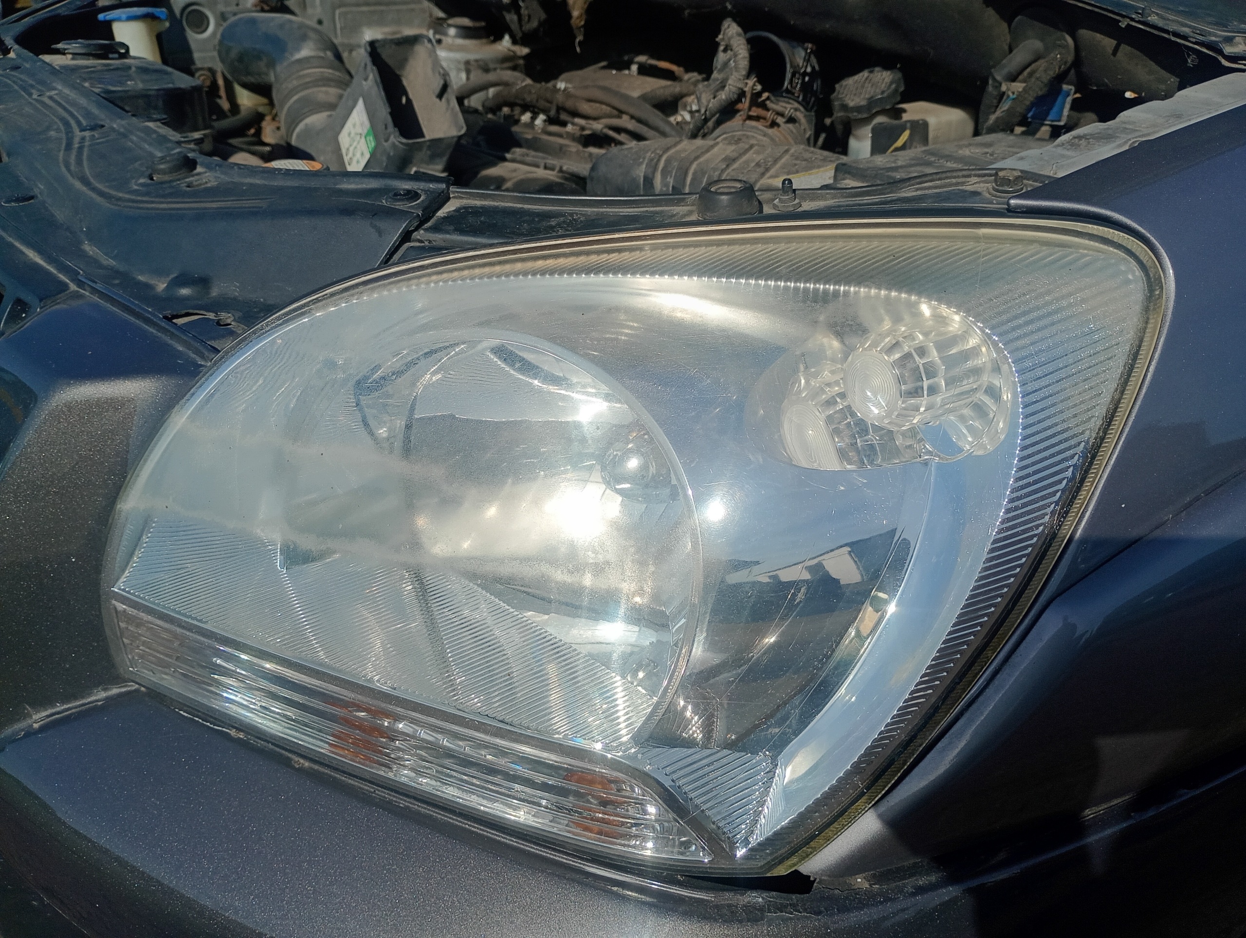 Reflektor light left front front Kia Sportage 2 II 04-10