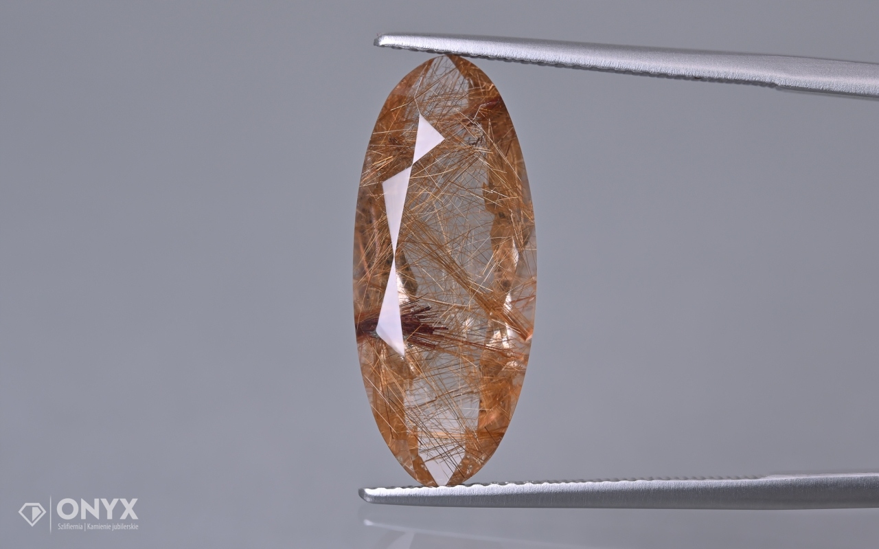 Křemen s rutilem fazetovaný ovál 21,5x9 mm