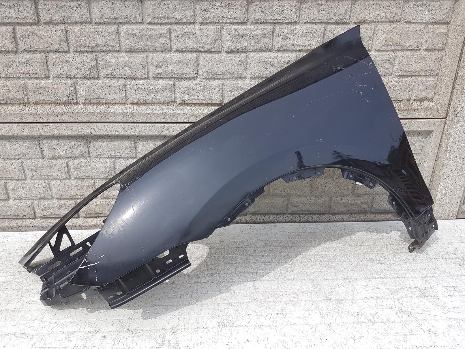 PORSCHE CAYENNE 2010-2014 BŁOTNIK PRZEDNI LEWY