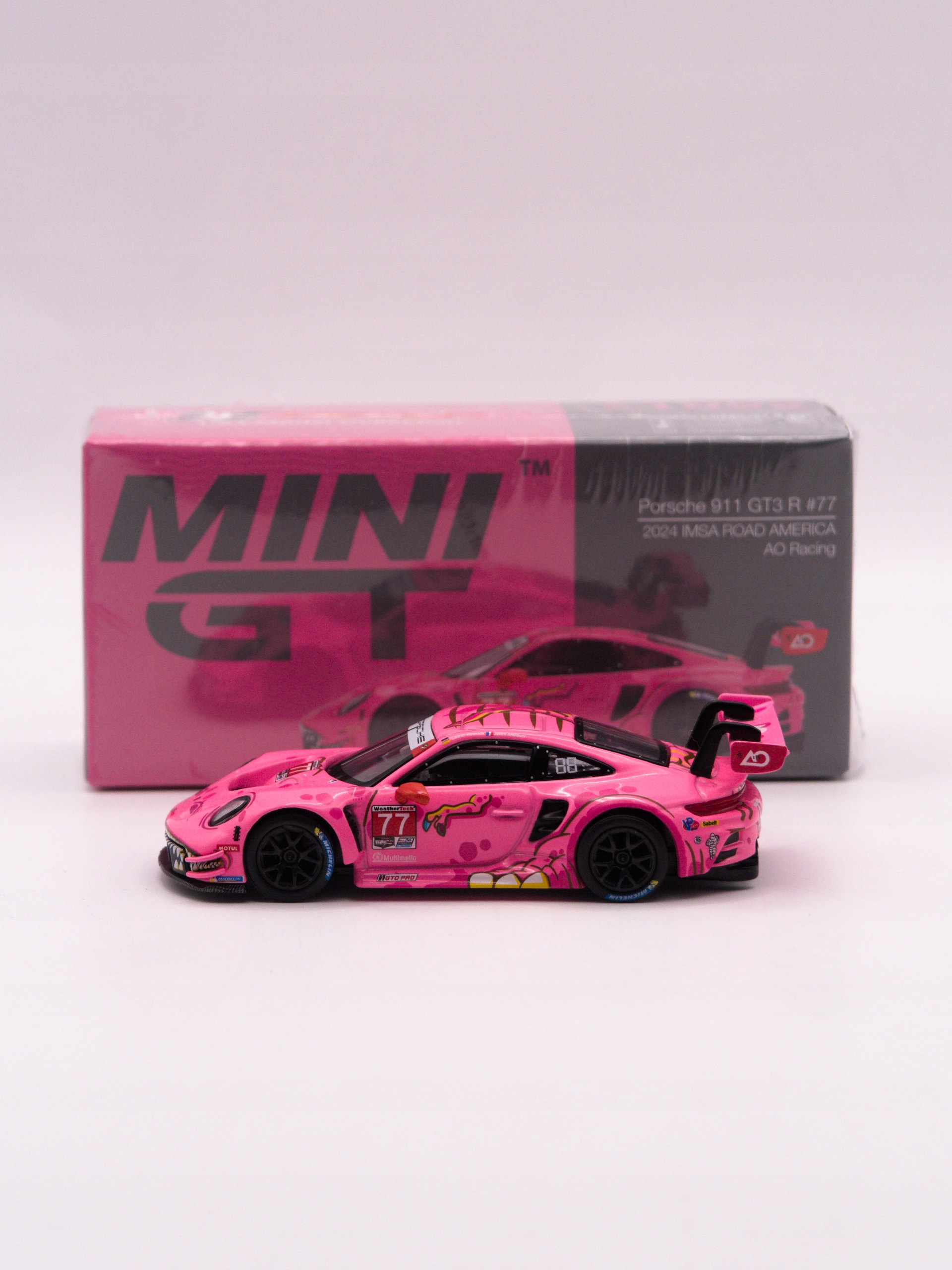 Mini GT #1052 ROXY Porsche 911 GT3 R #77 2024 IMSA ROAD AMERICA AO Racing