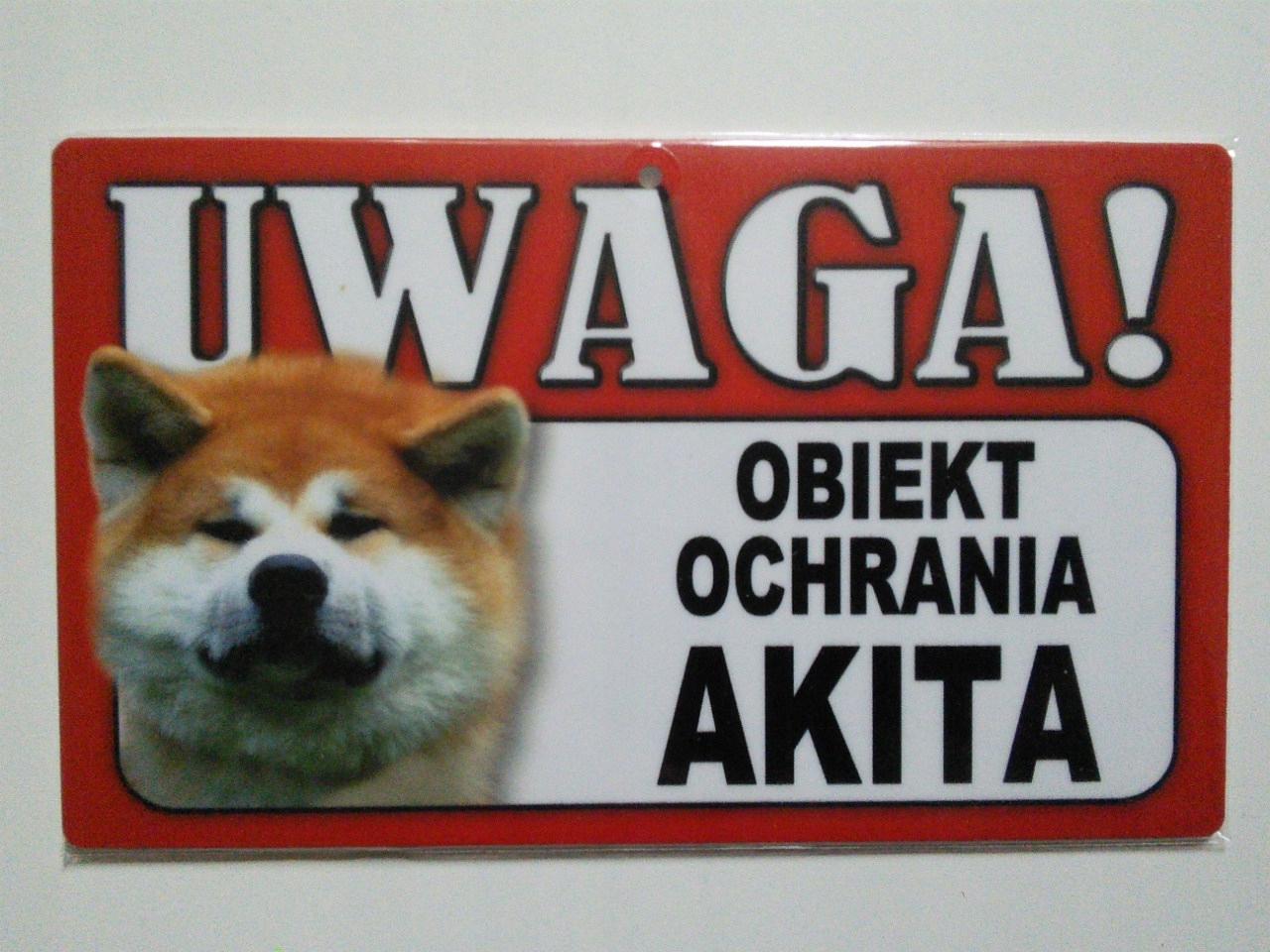 

Tabliczka ostrzegawcza Obiekt Ochrania Akita
