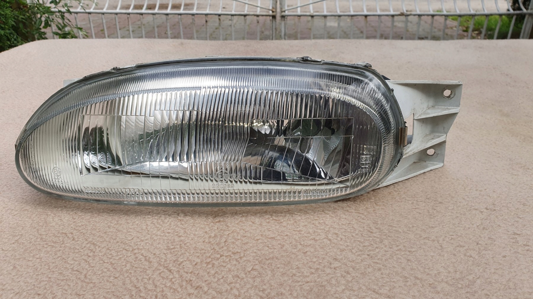 NISSAN 100NX LAMPA FAHR SCHEINWERFER HEADLIGHT