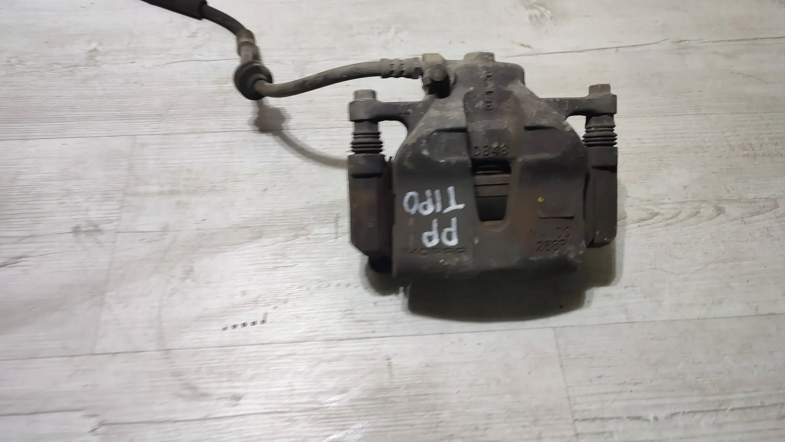 Fiat Tipo II HB 19r. 1.4 front side right caliper