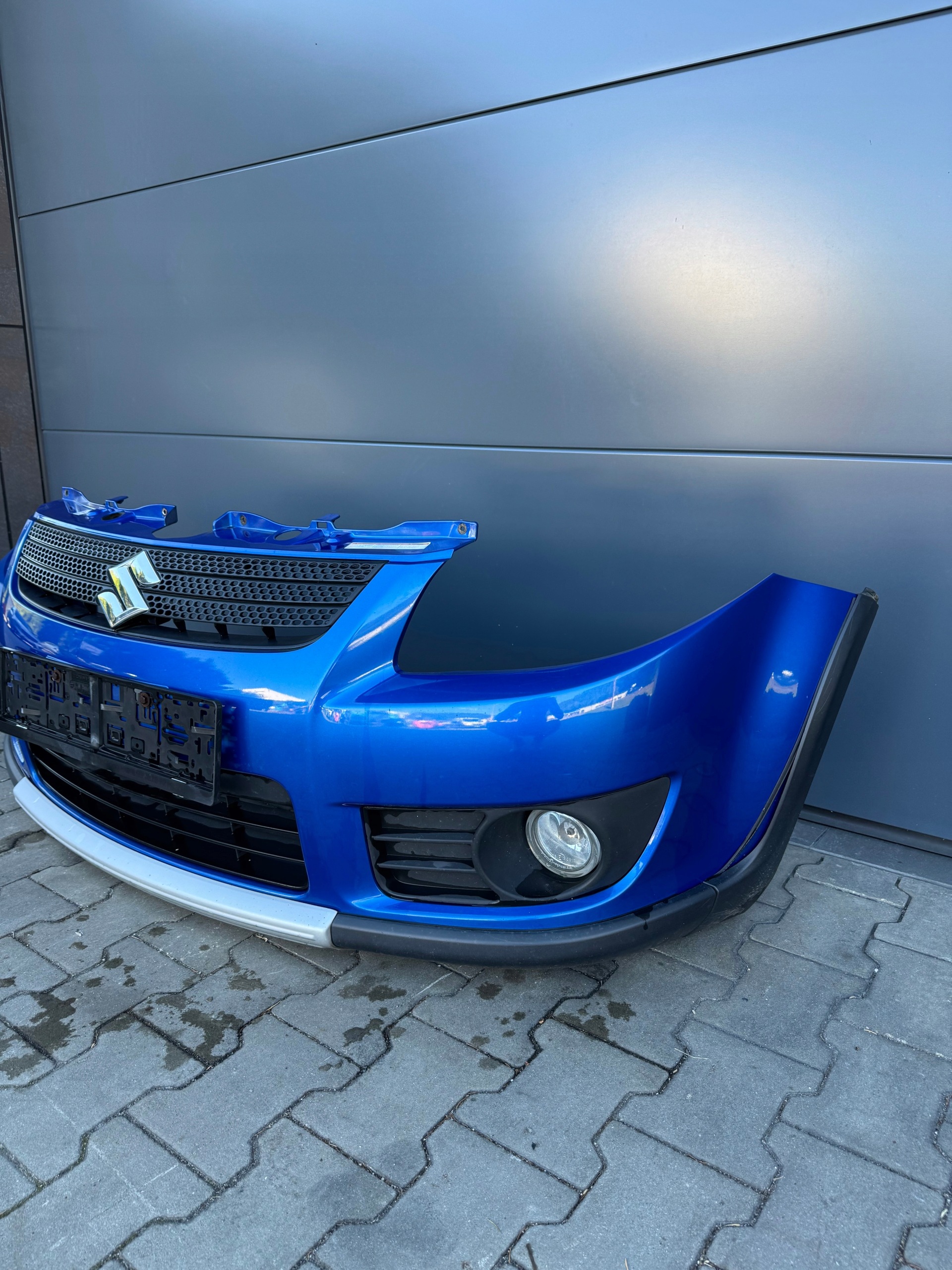 SUZUKI SX4 06R- bumper front front SX4 SX-4 original blue !