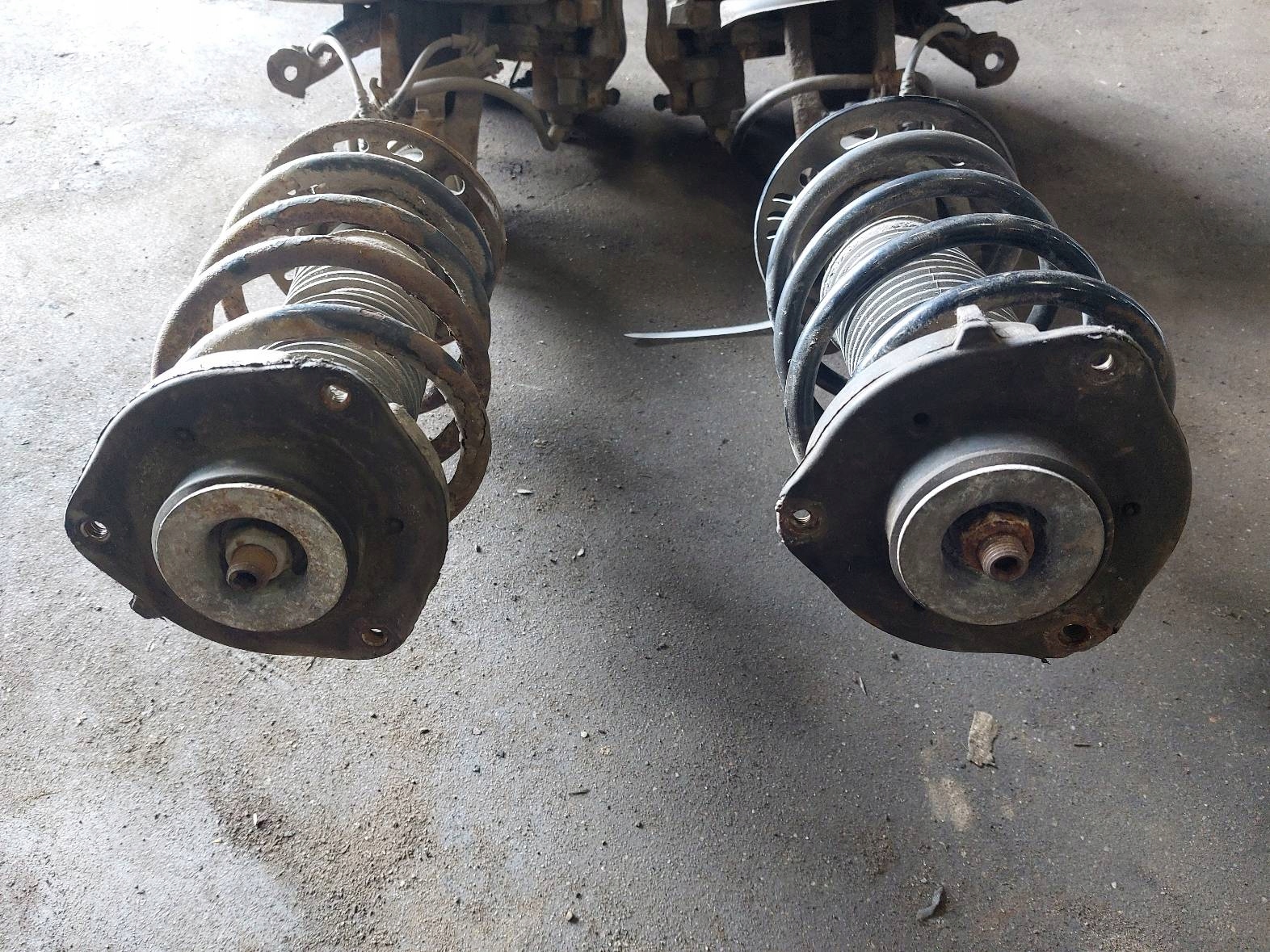 shock absorber spring swing left front + right front SKODA OCTAVIA II