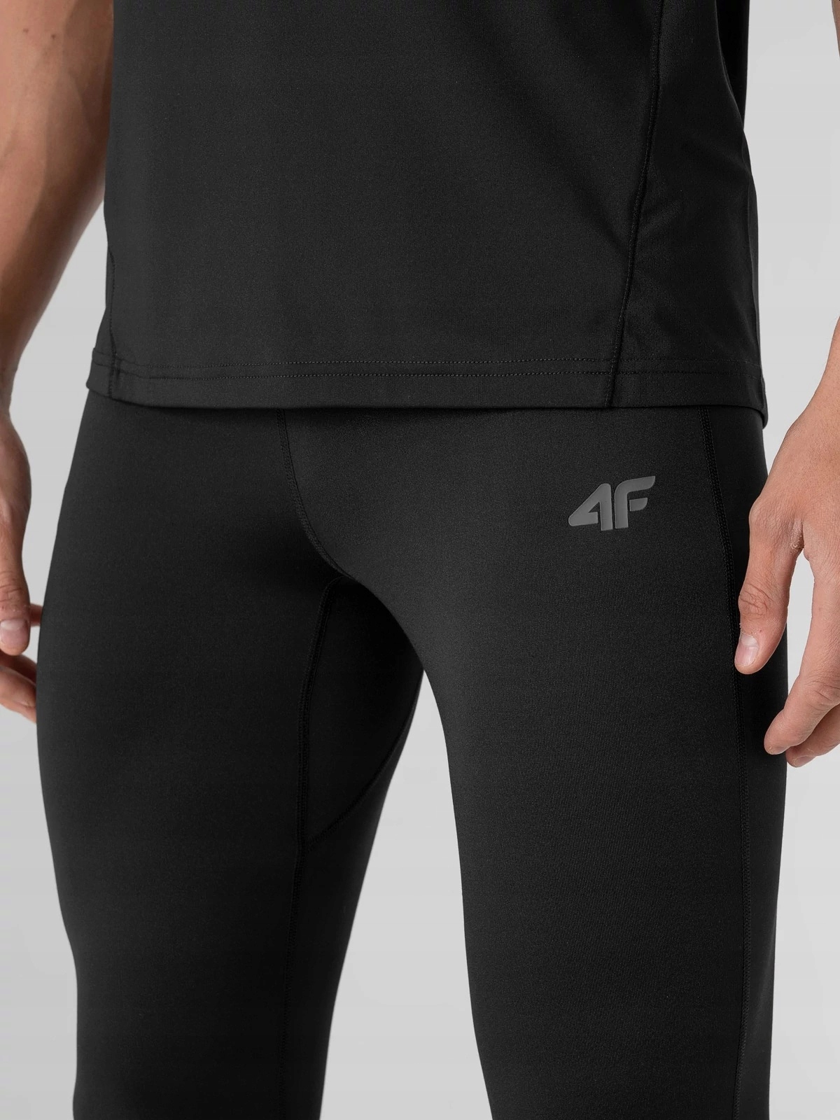 LEGGINSY TRENINGOWE SZYBKOSCHNĄCE MĘSKIE 4F BIEG L Długość nogawki długa