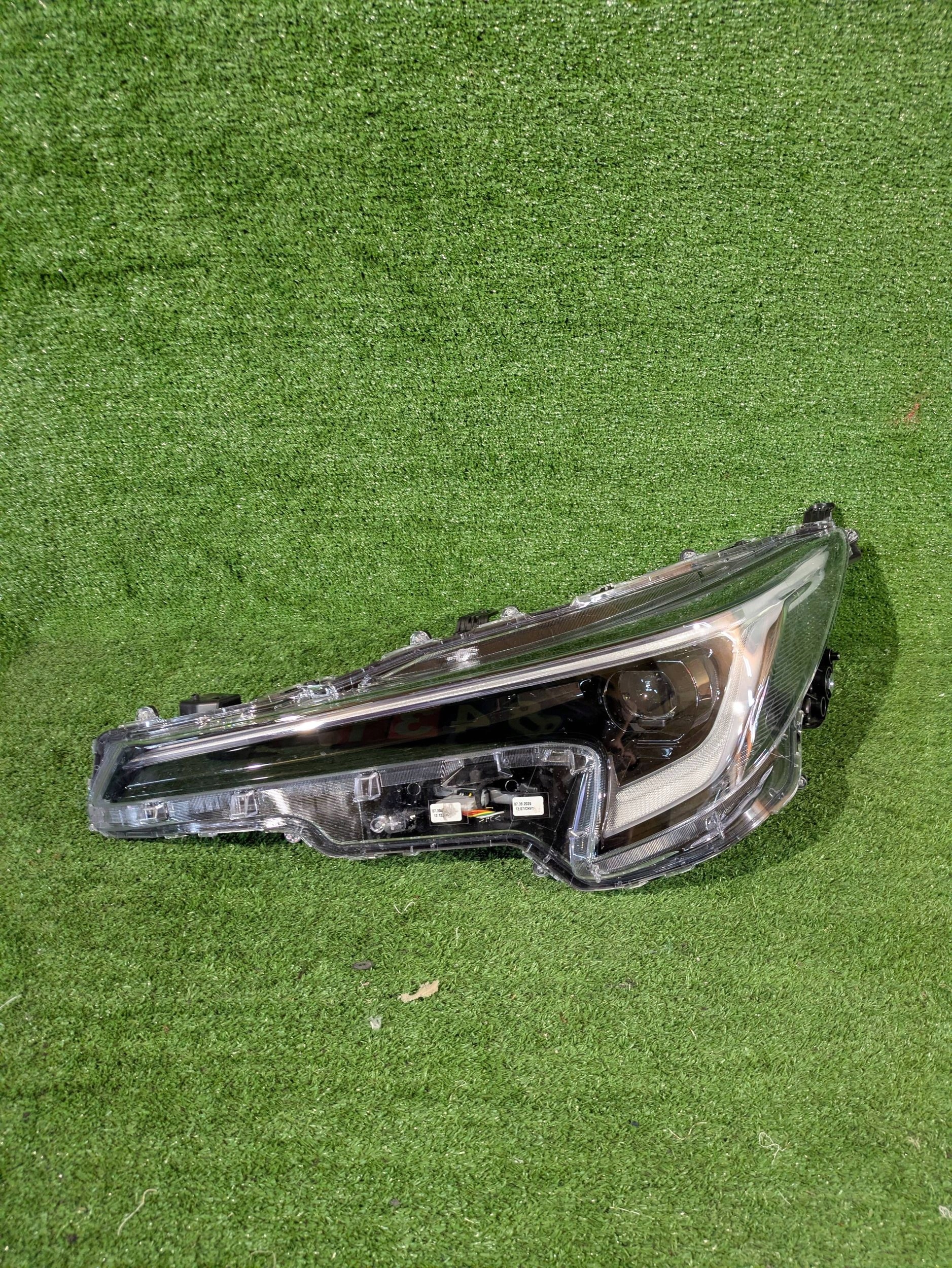 REFLEKTOR left front TOYOTA COROLLA E21 HB KOMBI LIFT NR.1348