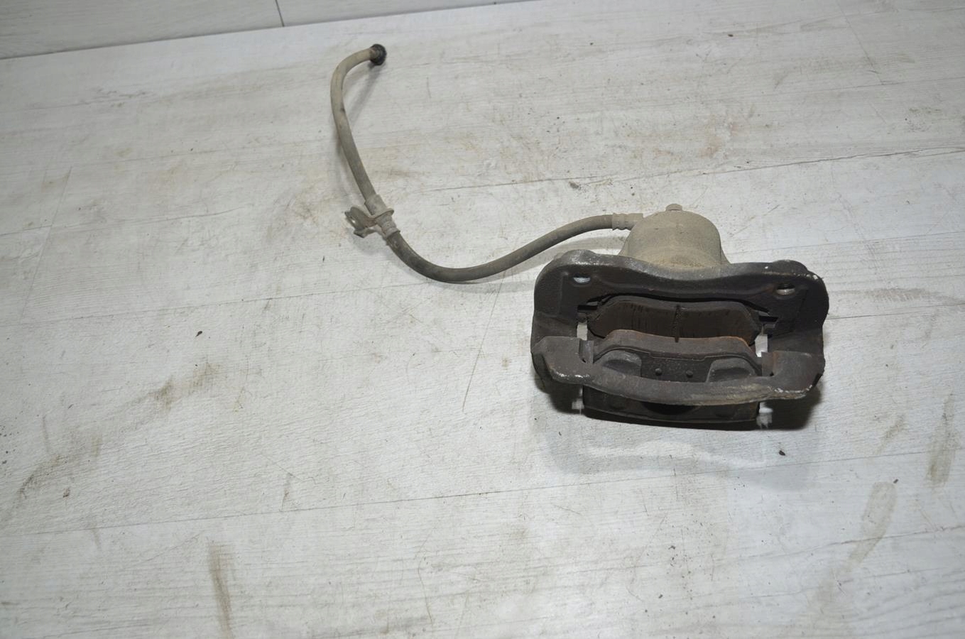 caliper left front Hyundai i20 II lift 5d