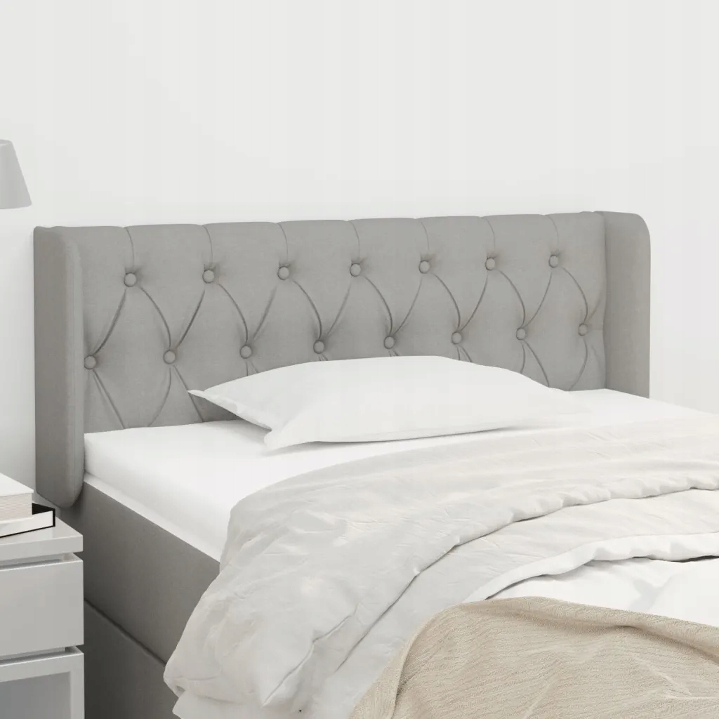 Čelo postele typu ušák světle šedé 103x16x78/88 cm textil Šedá 3119094