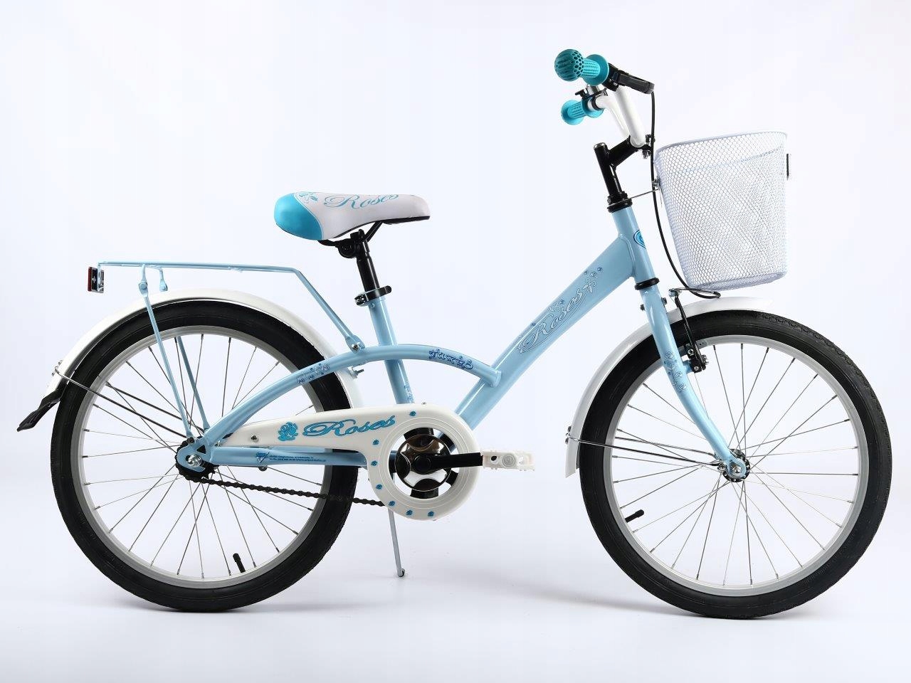 Rower dla dziewczynki Roses 20" błękitny bagażnik błotniki koszyk stopka Pl