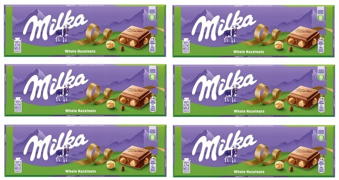 Levně 6x 250g Milka čokoláda s celými ořechy, půlka kartonu