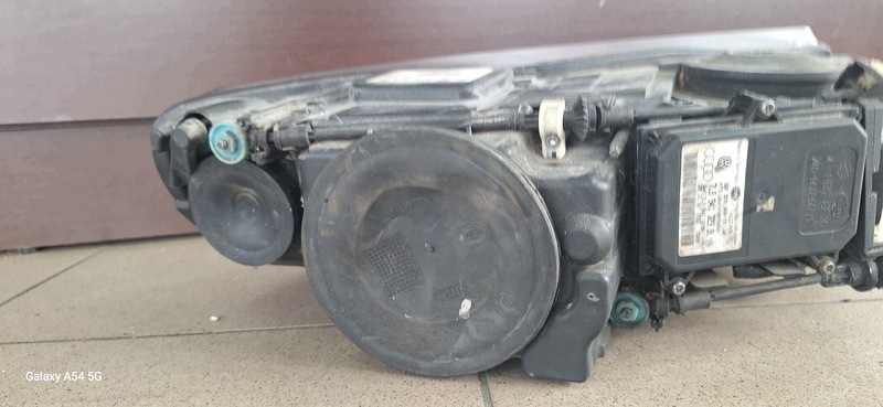 REFLEKTOR light front left VW TOUAREG BI-XENON 7L6941031C