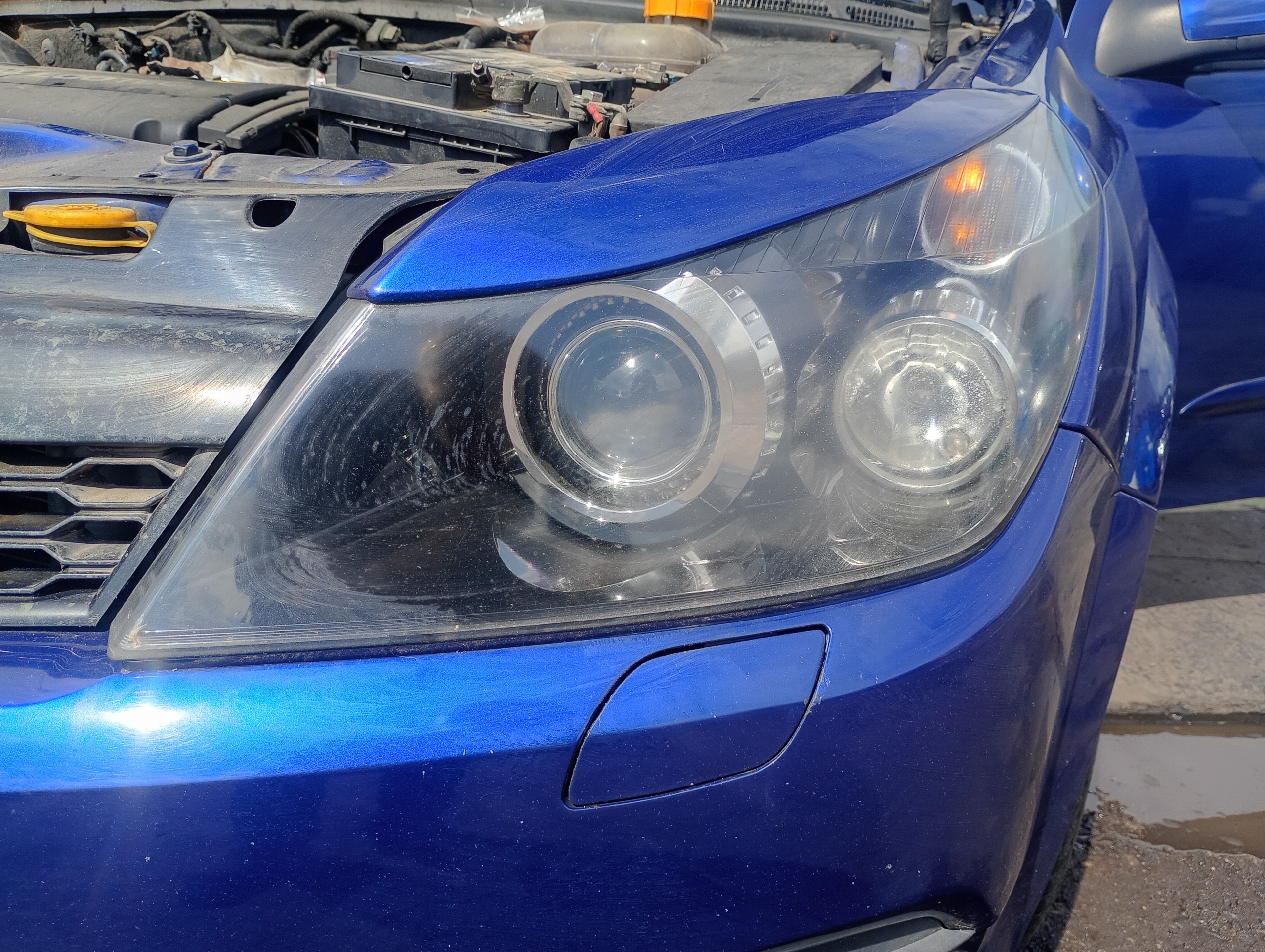 REFLEKTOR left light left front front XENON OPEL ASTRA H GTC 06-10