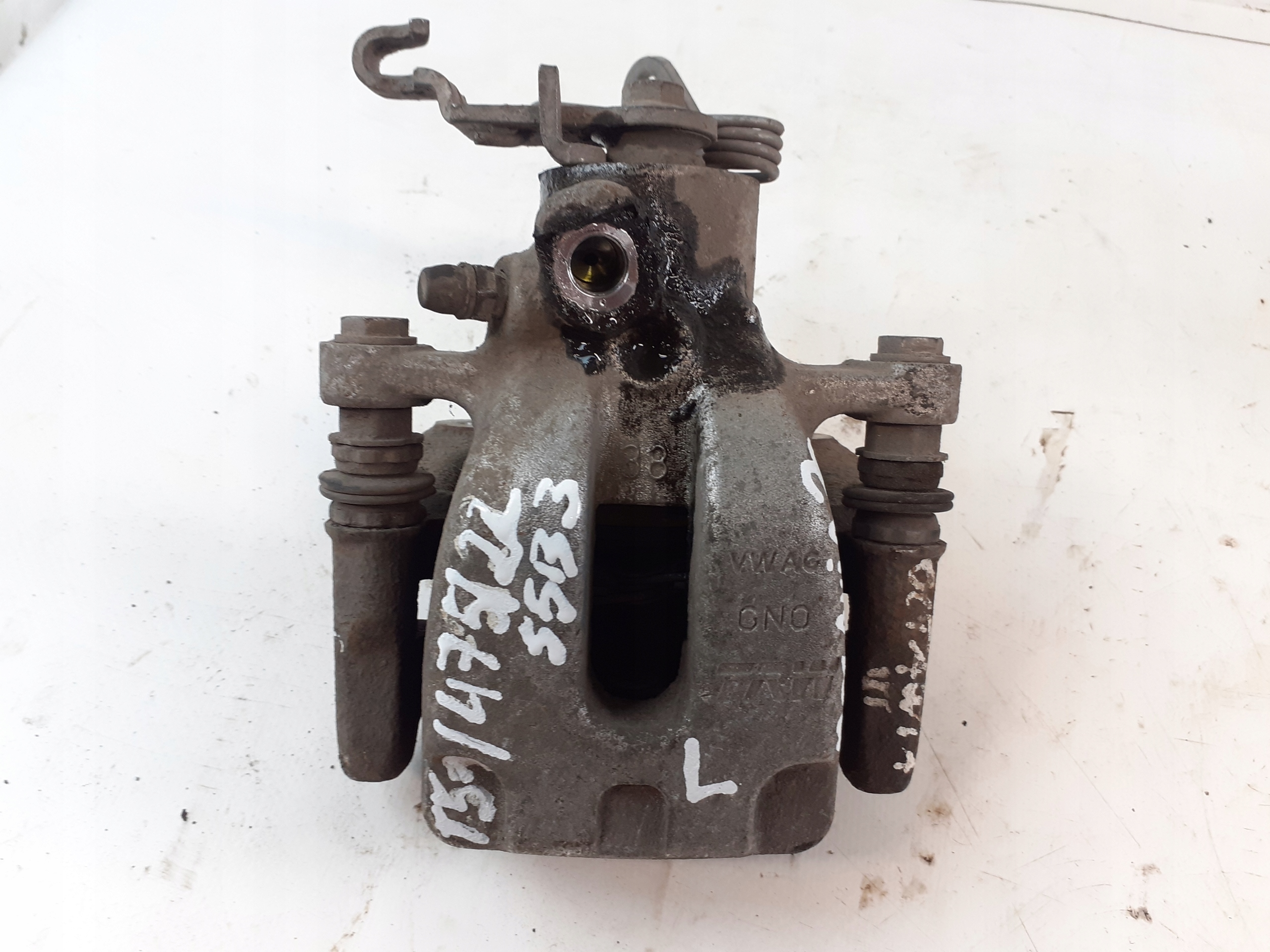 Skoda Octavia III caliper left rear part