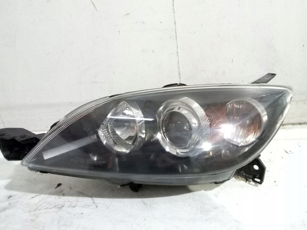 TYC Mazda 3 BK HB light left front front TYC