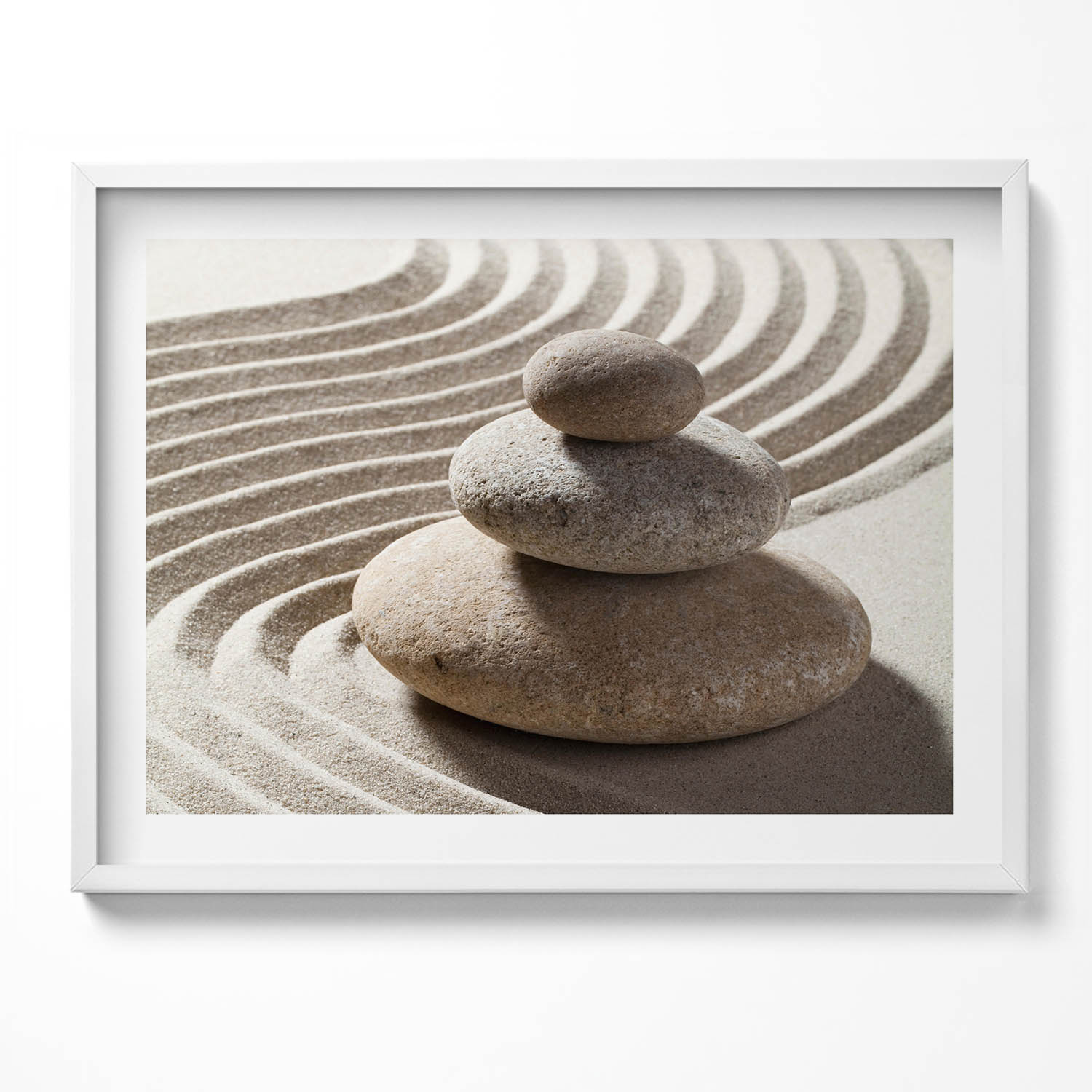 Dekorativní nástěnný obraz v rámu s grafikou Hromada kamenů na písku zen 80x60 cm