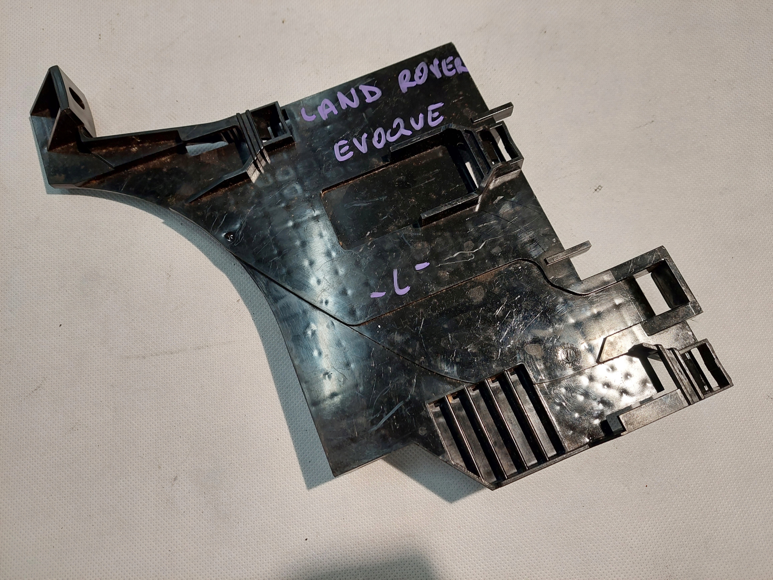 VPCCFX-13D084-B - LAND ROVER EVOQUE СЛАЙД ТРИМАЧ ФАРИ ЛІВИЙ