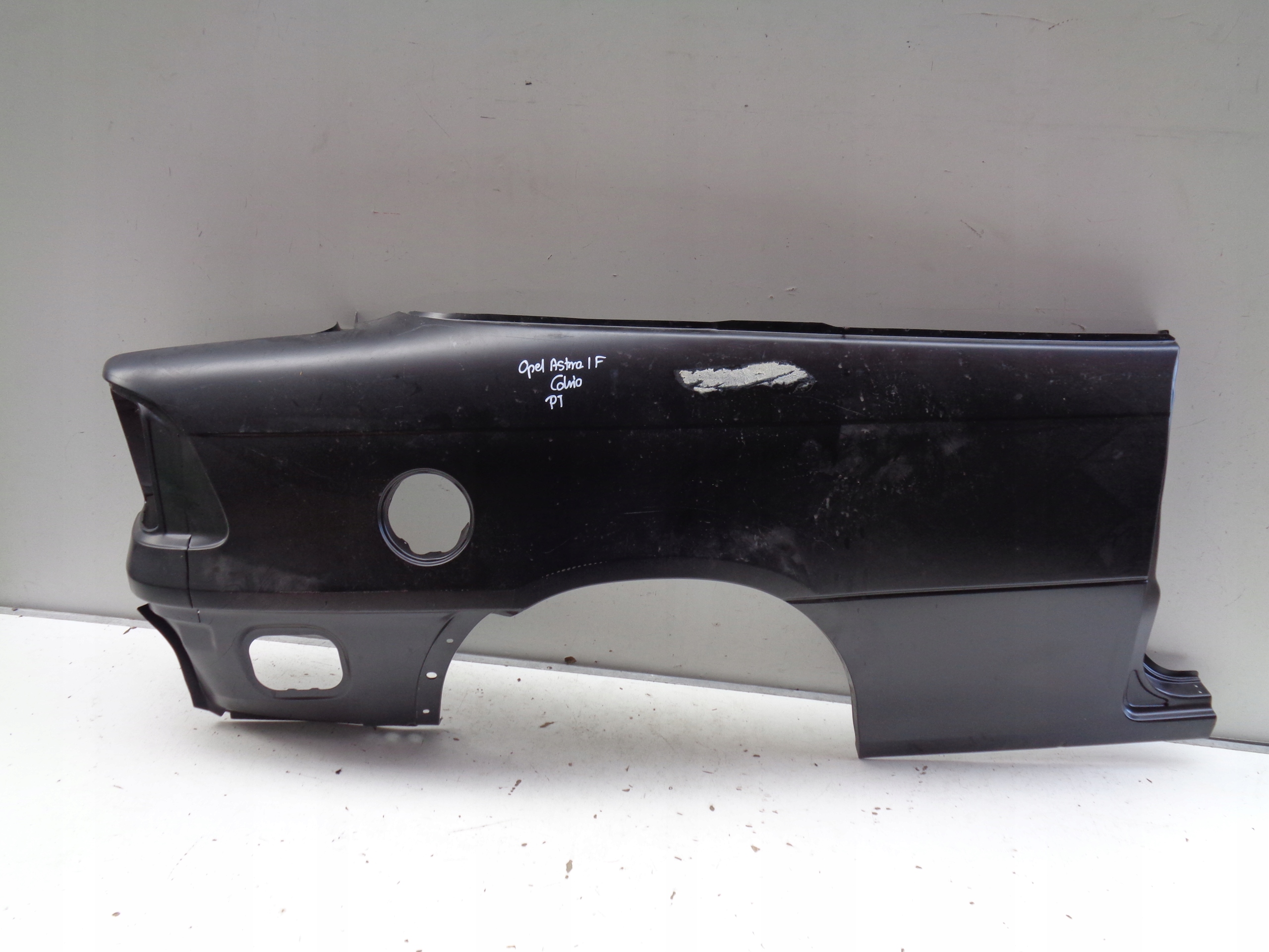 BŁOTNIK PRAWY TYLNY REPERATURKA OPEL ASTRA I F CABRIO