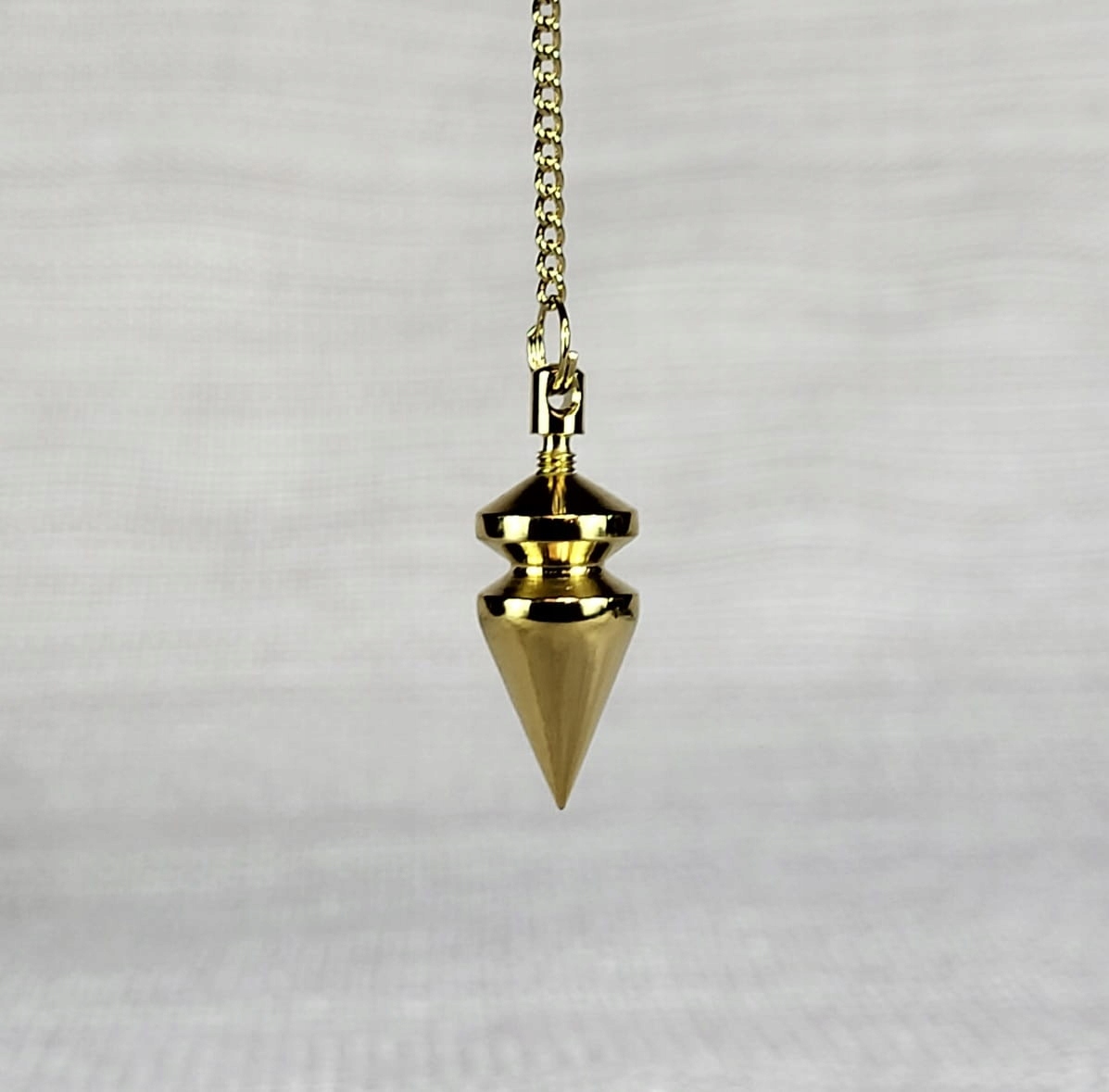 Wahadło Triangular Złocone