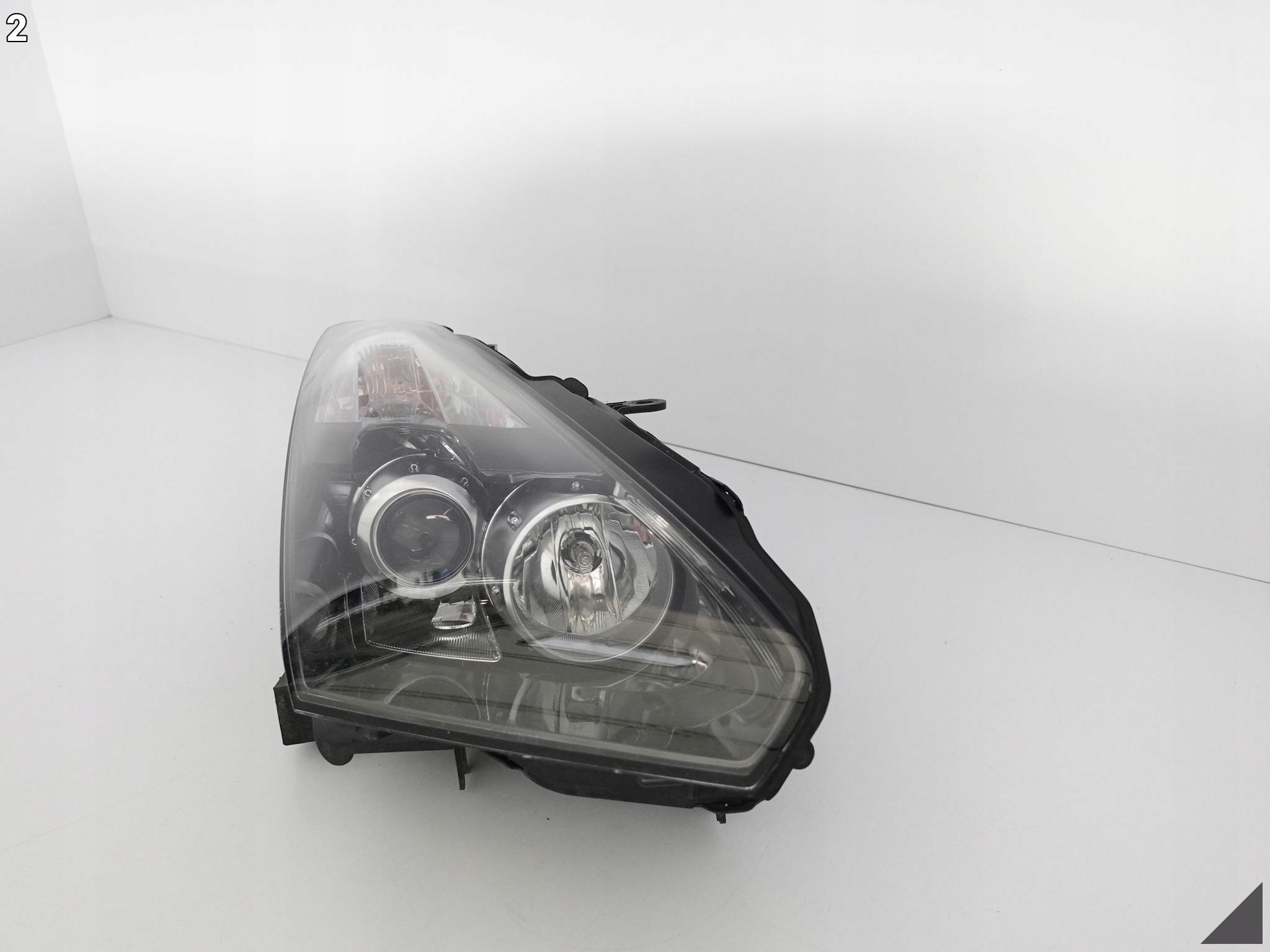 NISSAN GTR GT-R R35 08- LAMPA XENON PRAWA EUROPA Producent części Nissan OE