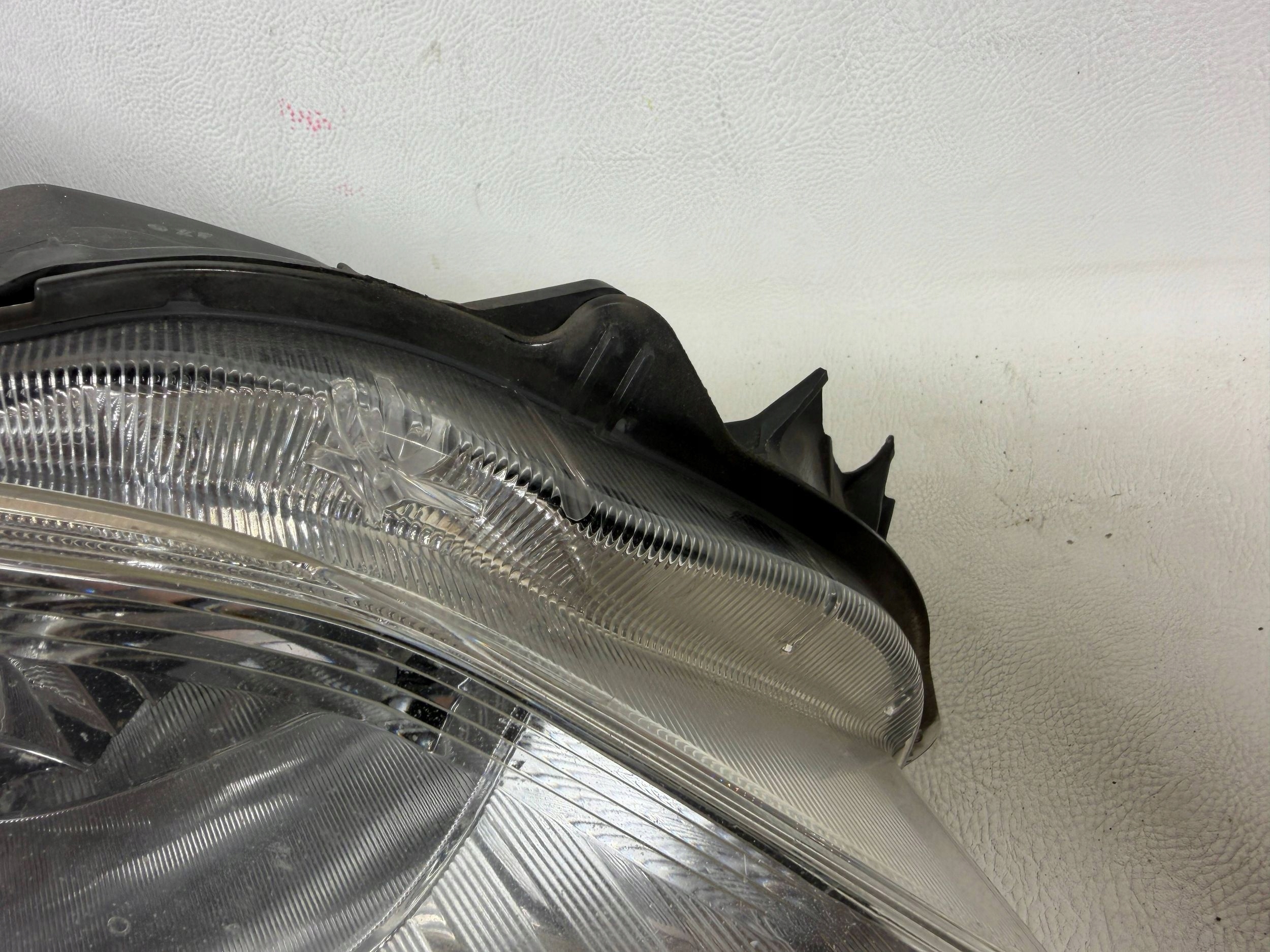 Subaru Outback light right Xenon 09- support front front