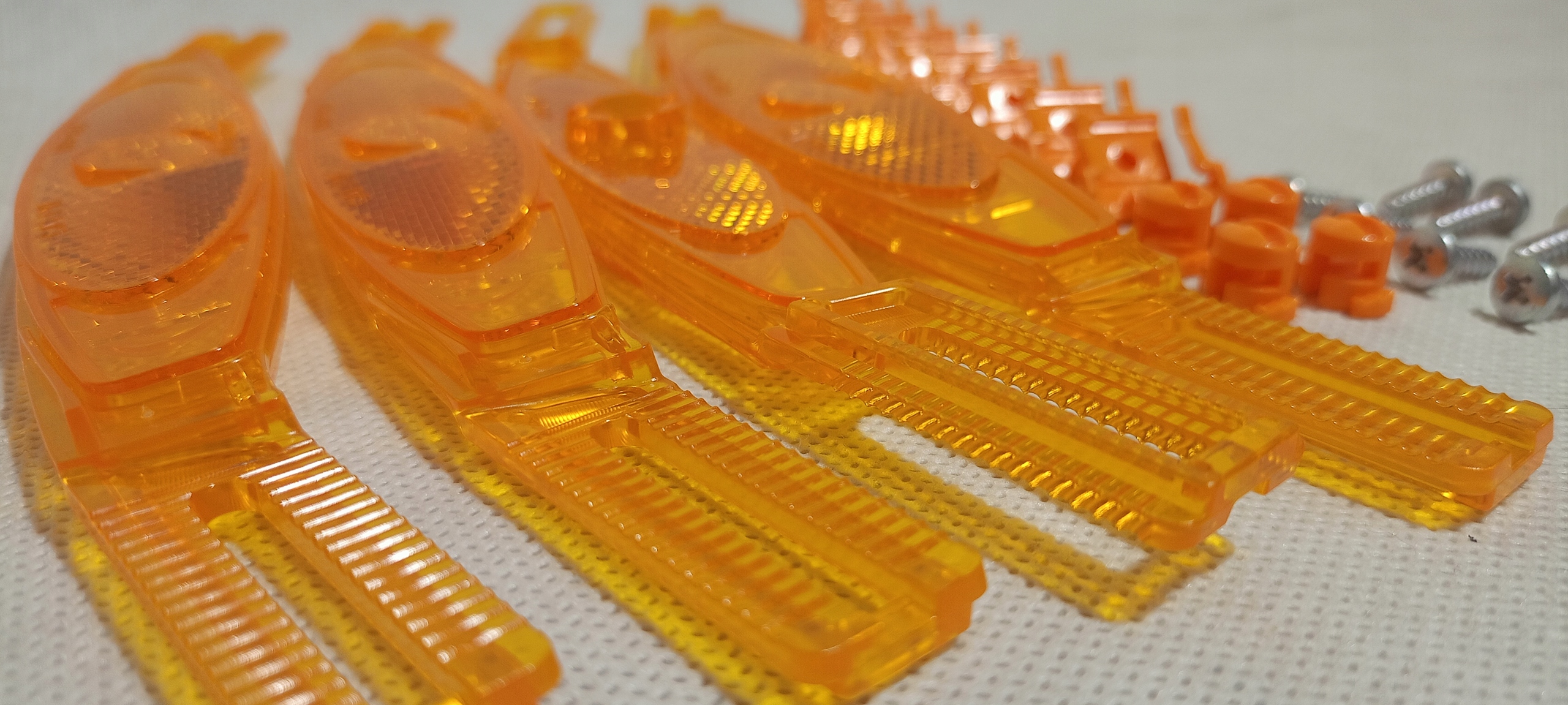 Odblaski na szprychy roweru CATEYE pomarańczowe zestaw 4 sztuki Model RR-317