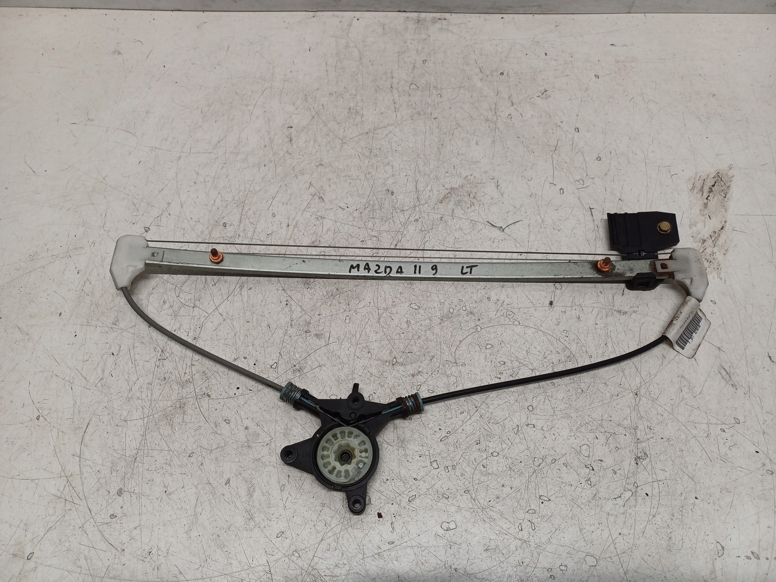 MAZDA 2 II DY 02-07 MECHANIZM SZYBY LEWY TYŁ