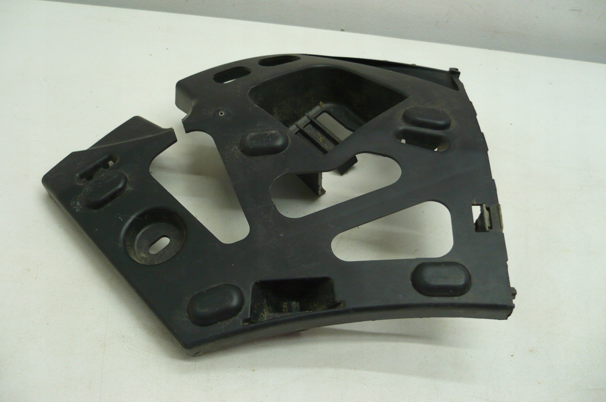 PEUGEOT 207 holder bumper bracket left front 06-12