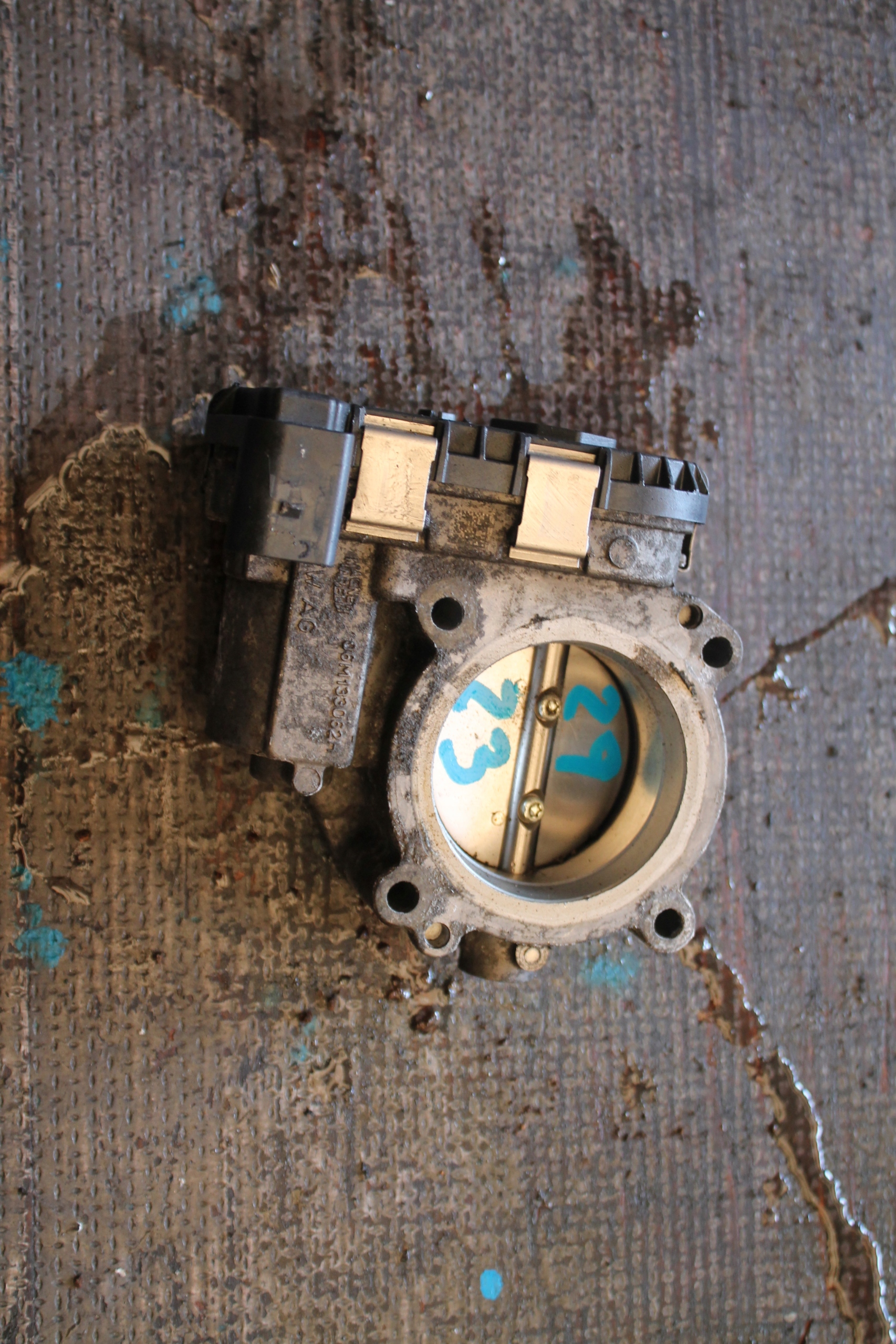 2923. throttle flap AUDI 06M133062H