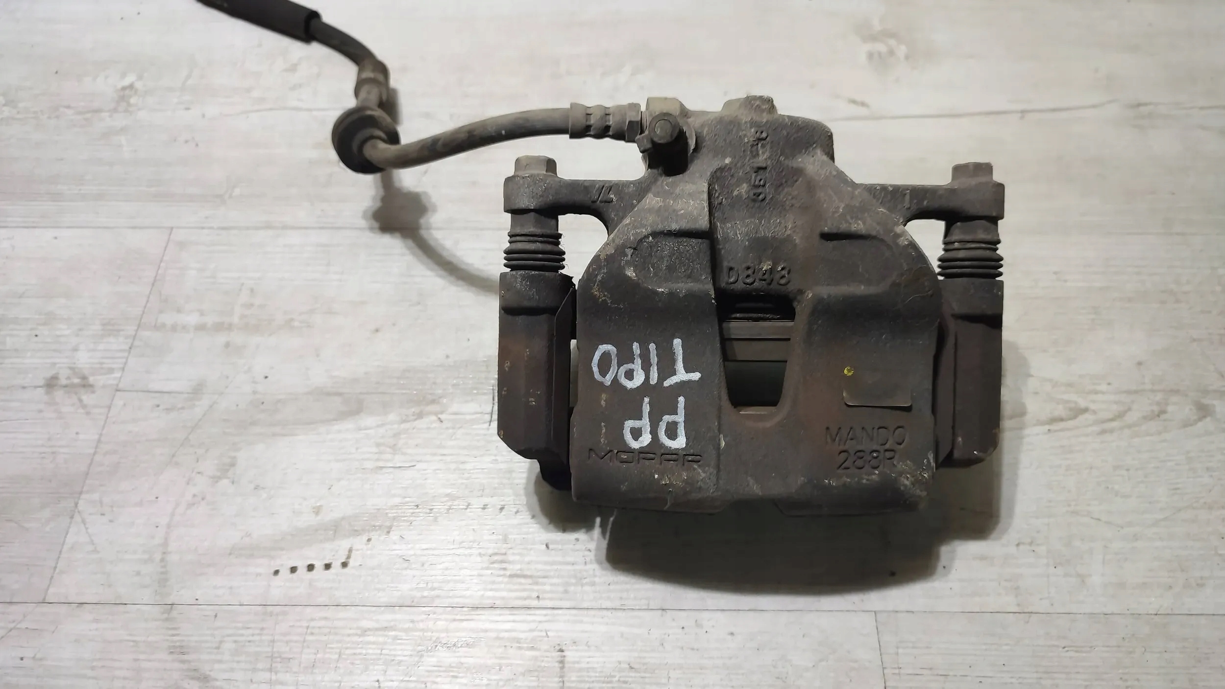 Fiat Tipo II HB 19r. 1.4 front side right caliper