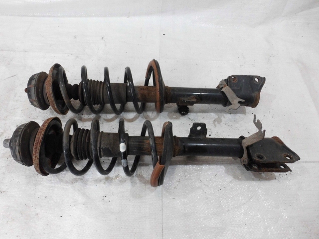 DUSTER 1.6 16V MCPERSON AMORTYZATOR LEWY PRAWY