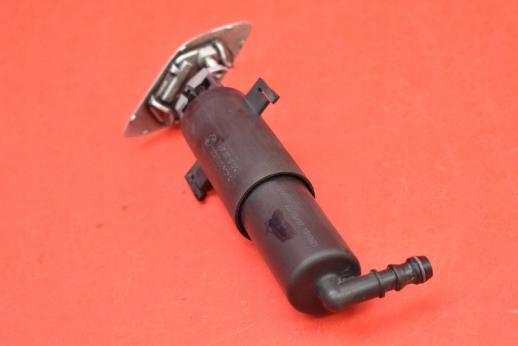 washer REFLEKTOROW left SREBRNY 7179311-02 BMW E93 04-10