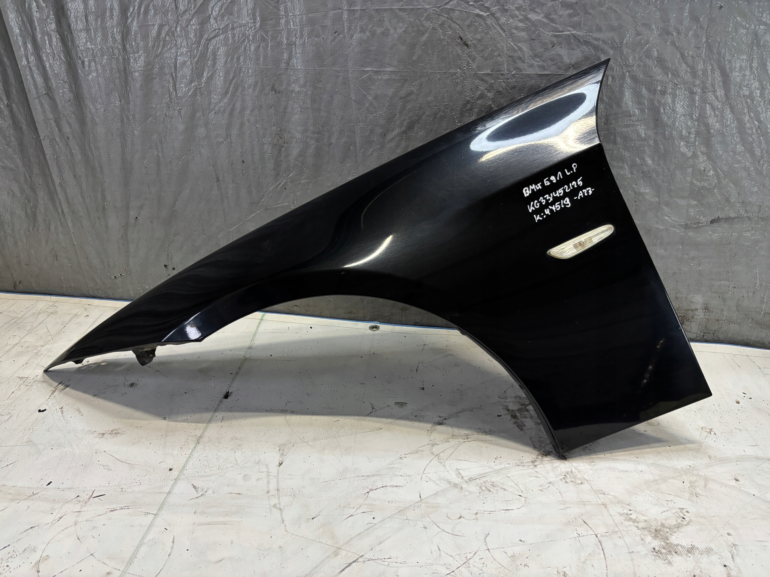 fender left front BMW E91 przedlift k: 475/9 Black Sapphire Metallic