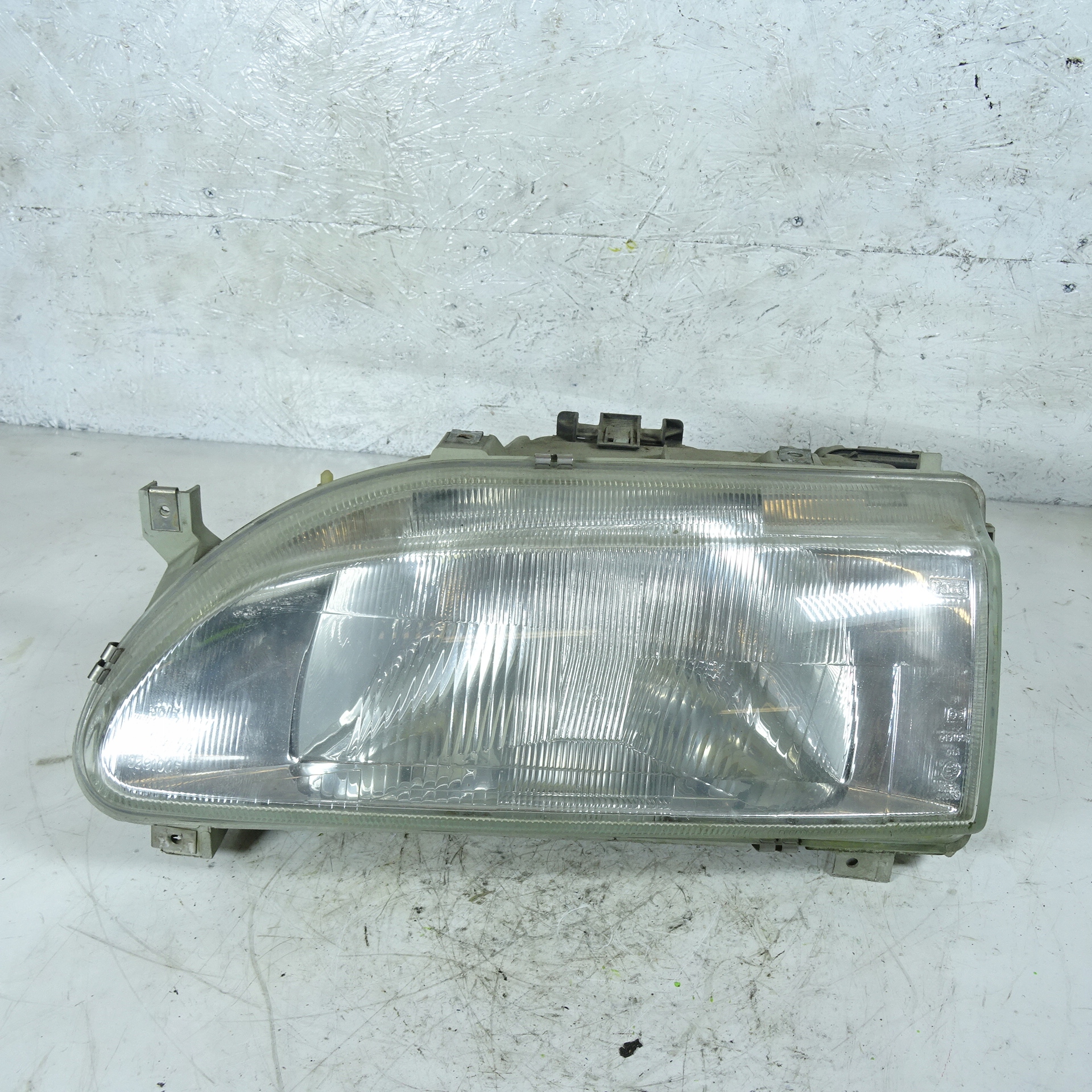 RENAULT 19 REFLEKTOR levý