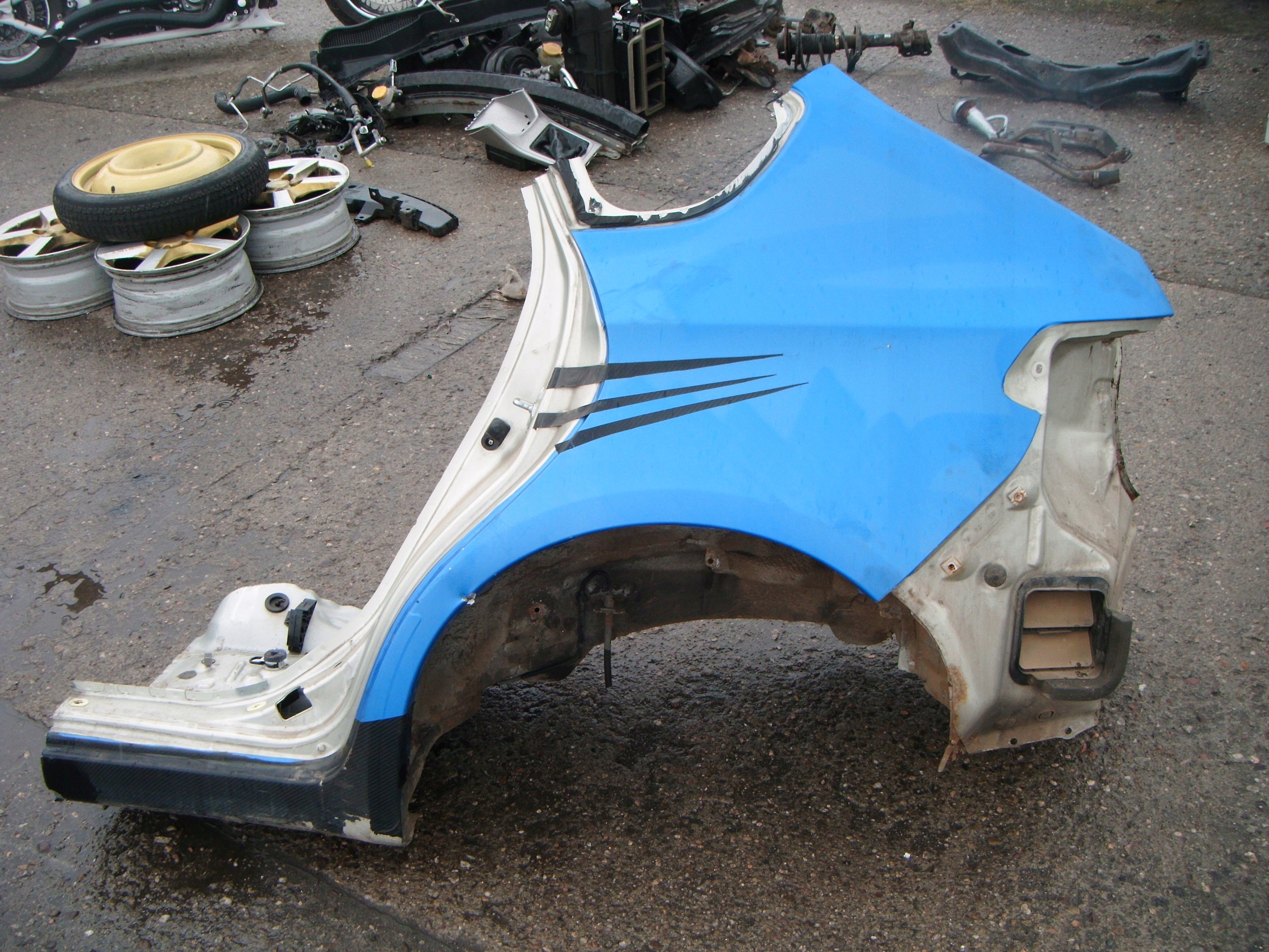 SUBARU IMPREZA III GH HB BŁOTNIK LEWY TYŁ