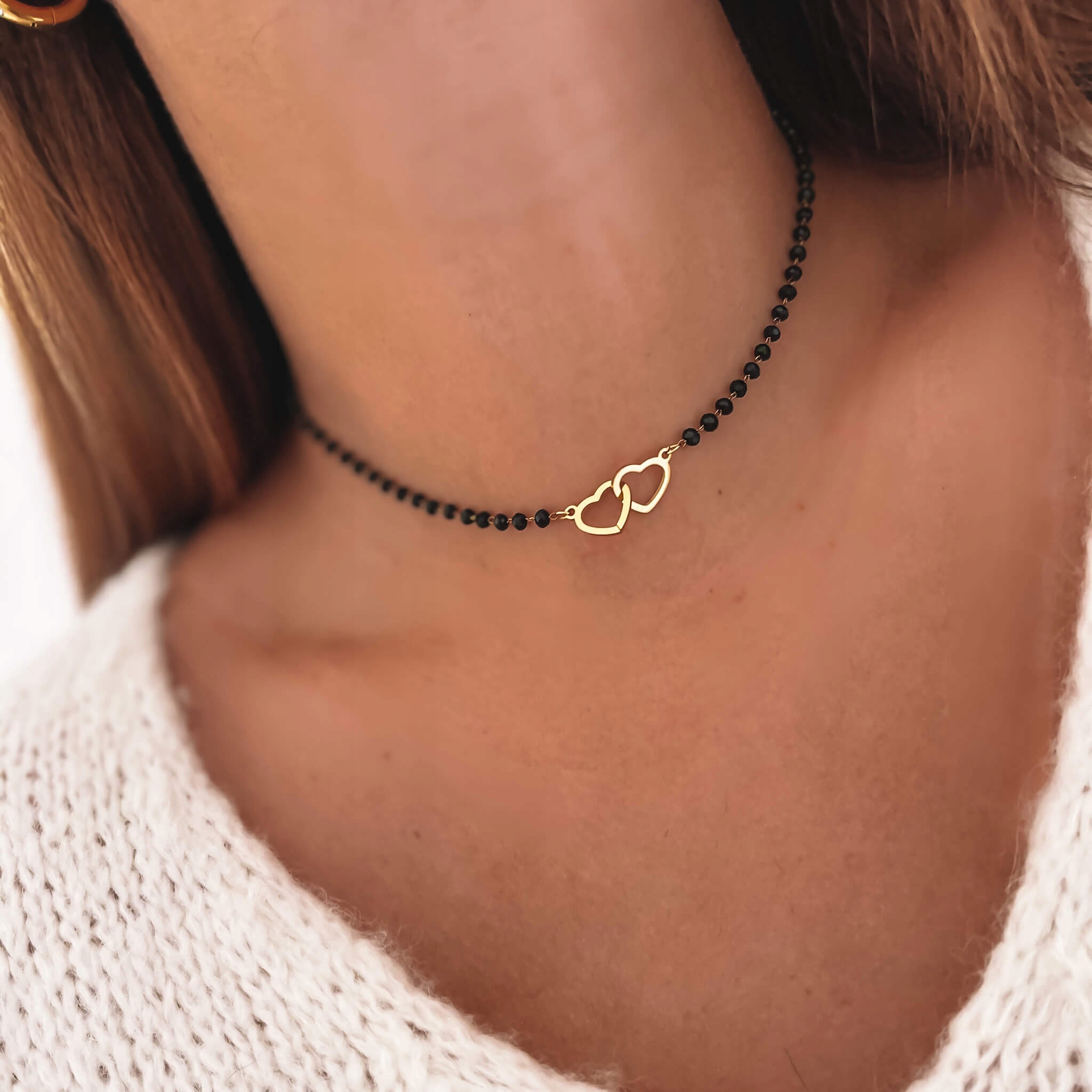 

Naszyjnik czarne koraliki serduszka ze stali 316