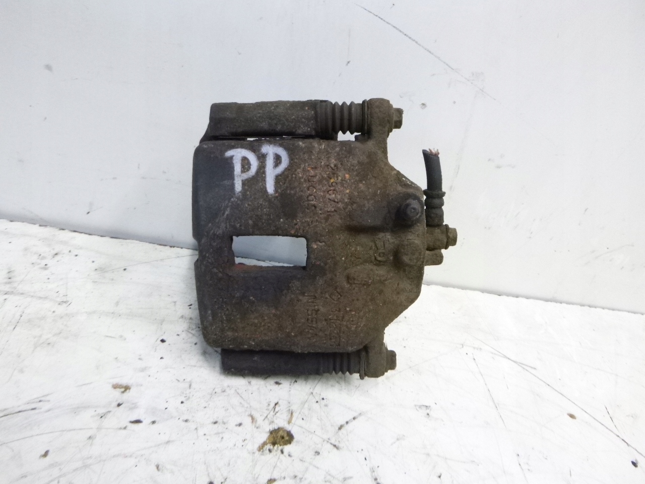 caliper brake front right Nissan Primera P12 1.8 02-07r.