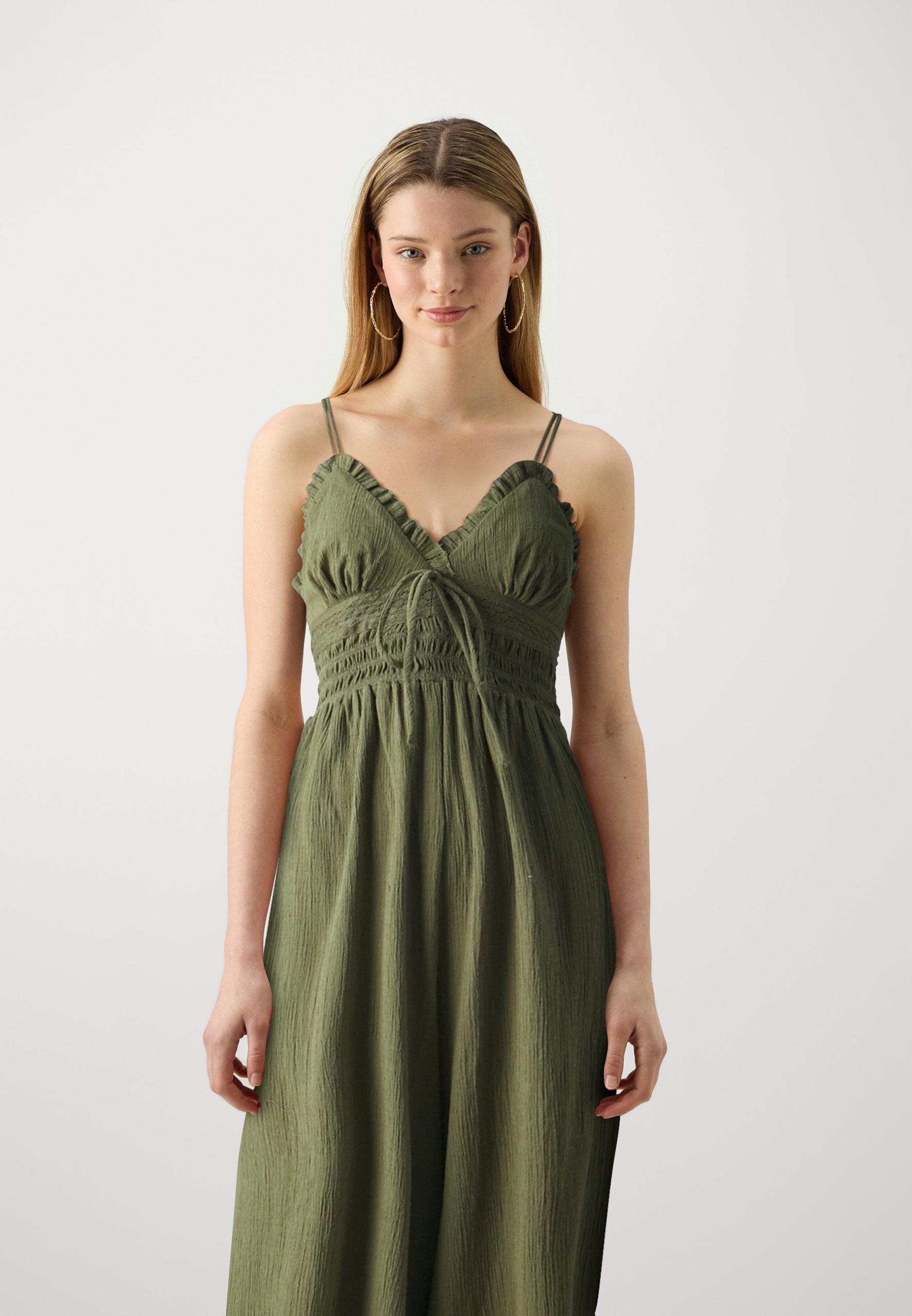 Olivová letní kombinéza Urban Outfitters Xs