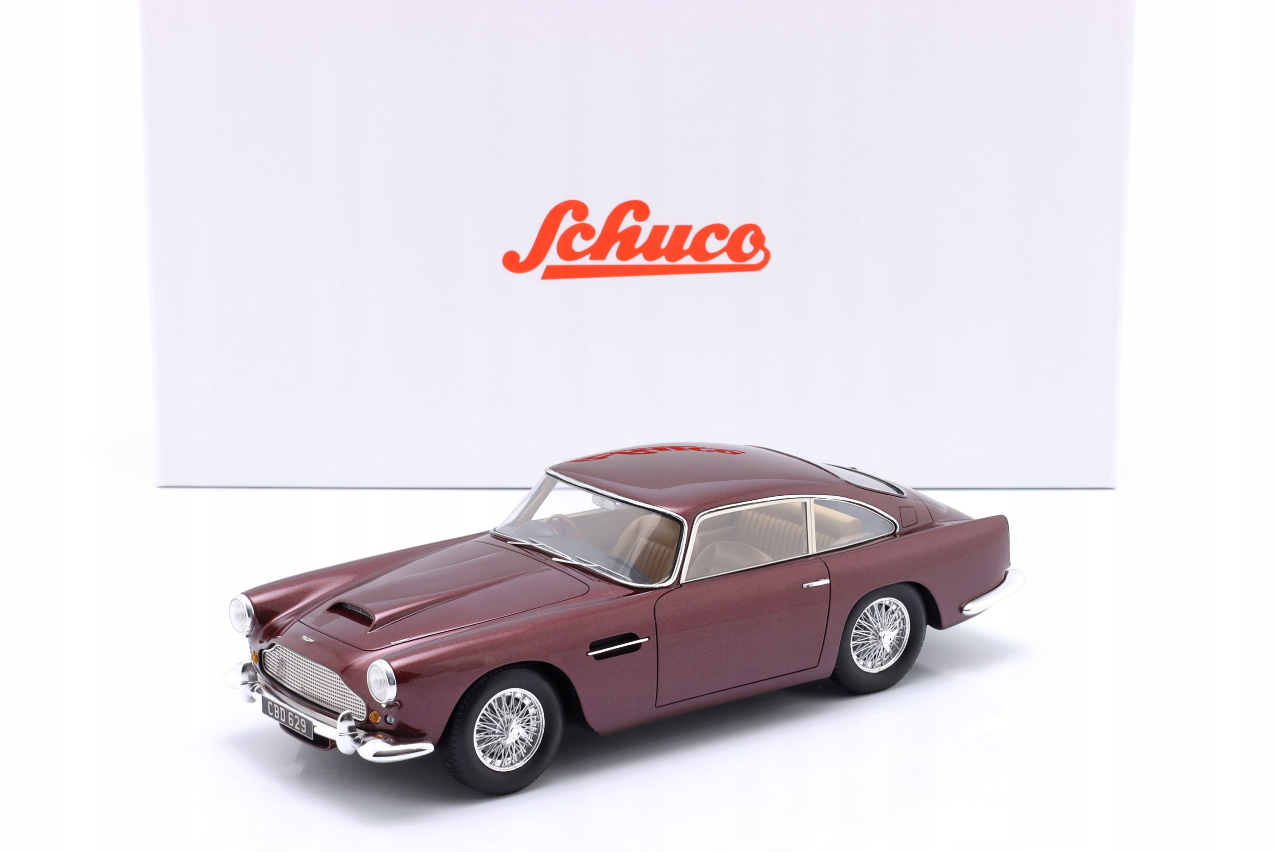 Schuco Aston Martin DB4 Mk2 1960 Wine red 1:18