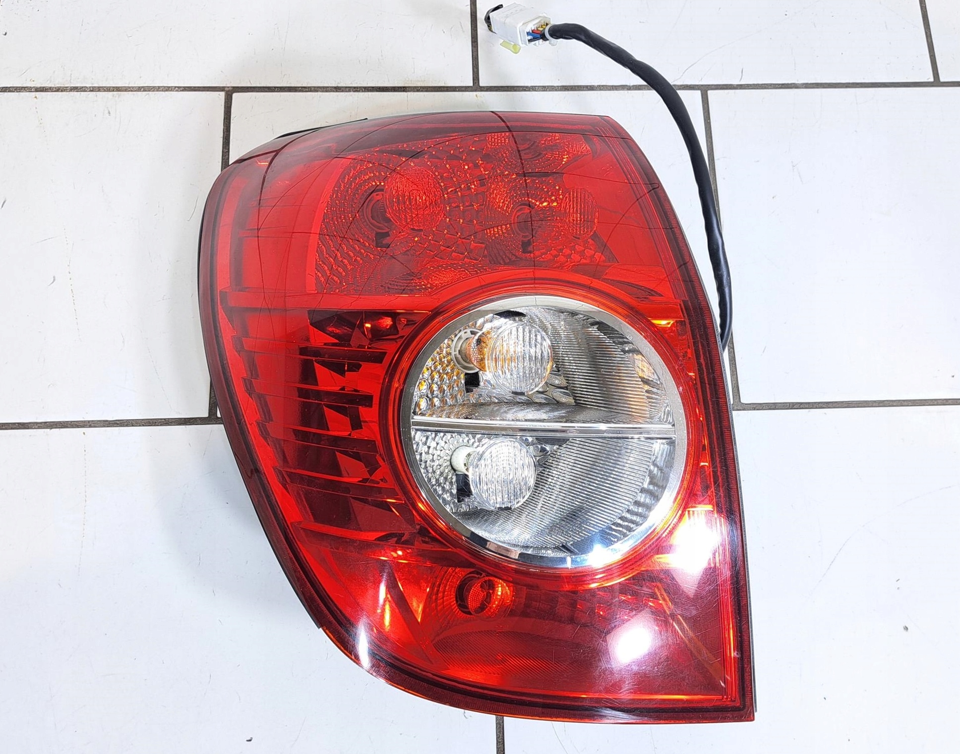 CHEVROLET CAPTIVA LIFT 2010-> LAMPA LEWA LEWY TYŁ TYLNA