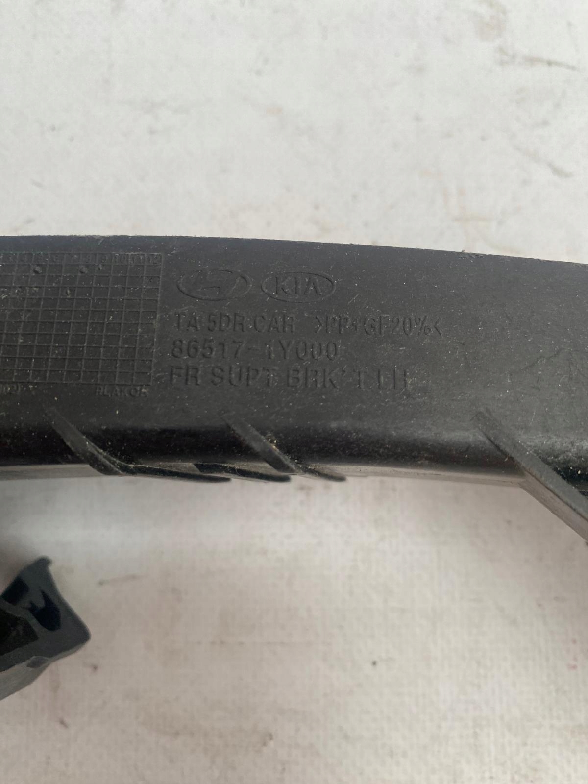 KIA PICANTO II 11- holder bumper bracket front left